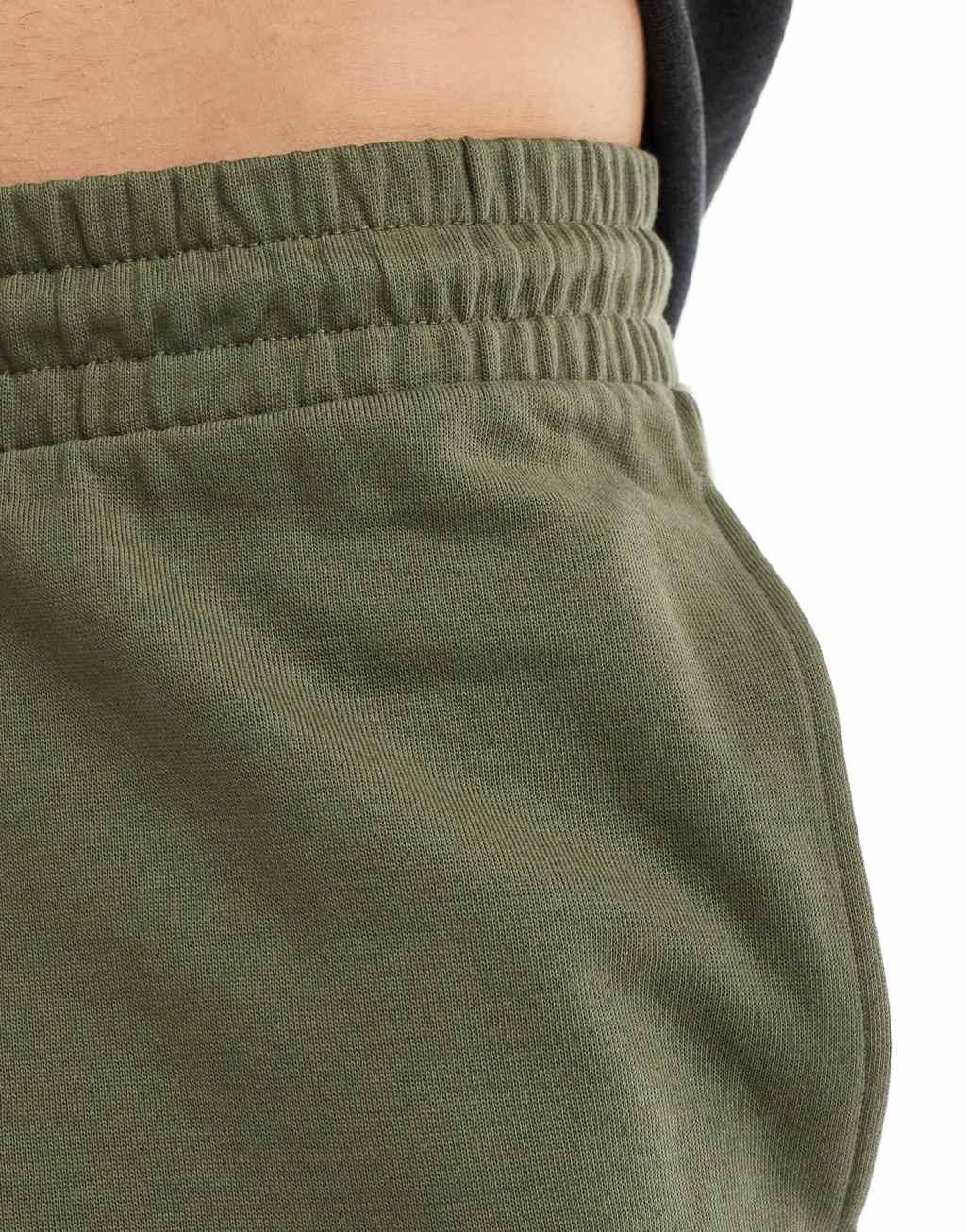 ASOS DESIGN skinny fit shorts in khaki Product Image