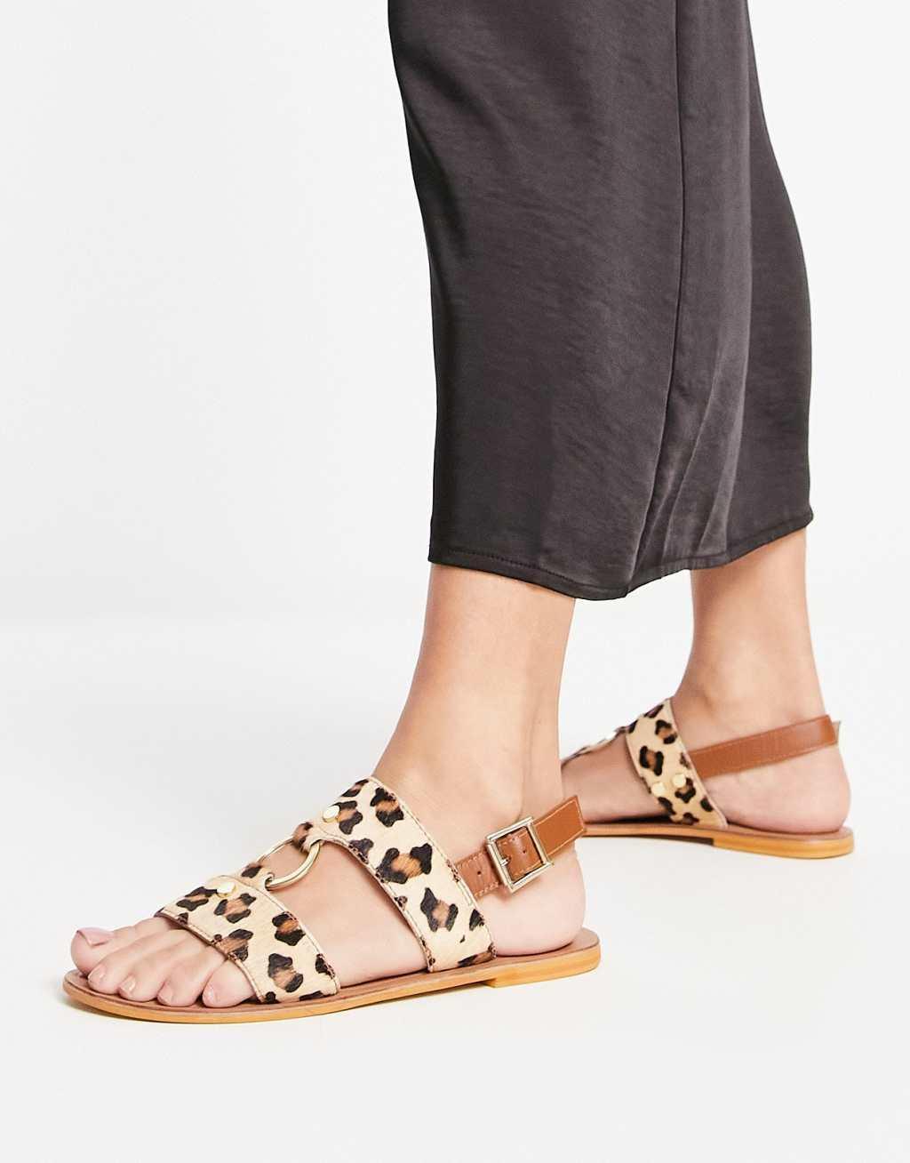 ASOS DESIGN Fancy leather ring and stud detail flat sandals in leopard Product Image