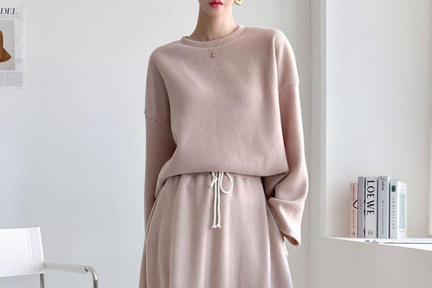 Set: Long-Sleeve Plain Loose-Fit Top + Drawstring Waist A-Line Midi Skirt Product Image