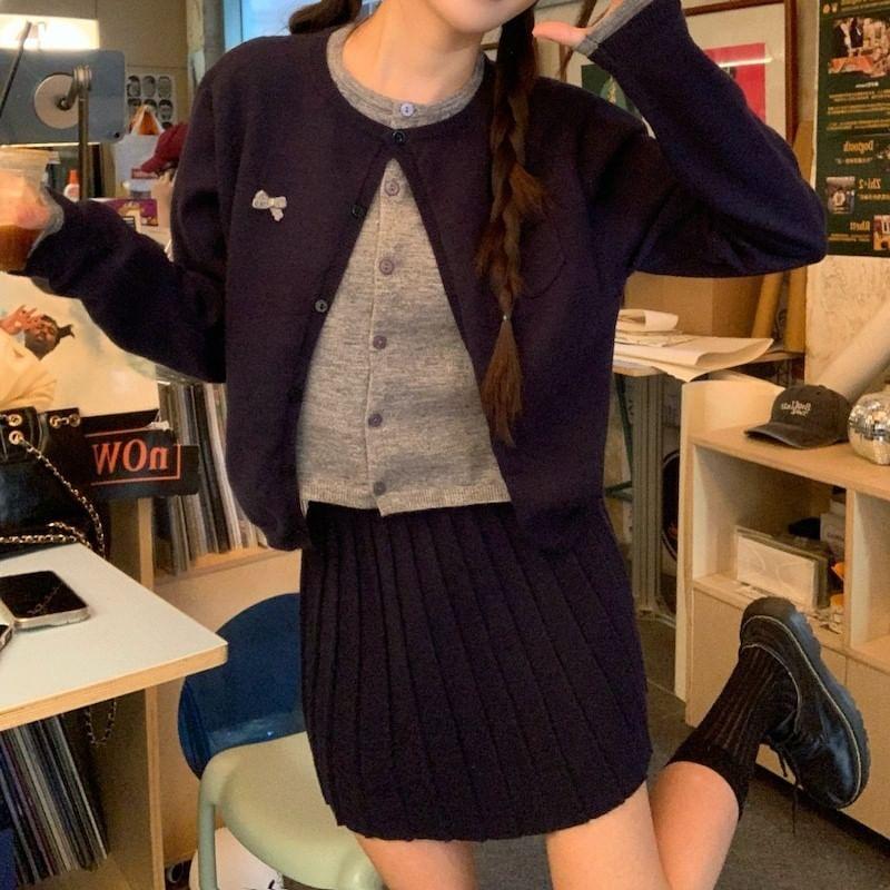 Crew Neck Mock Two-Piece Two Tone Bow Accent Button-Up Crop Cardigan / High Waist Plain Pleated Mini A-Line Skirt Product Image