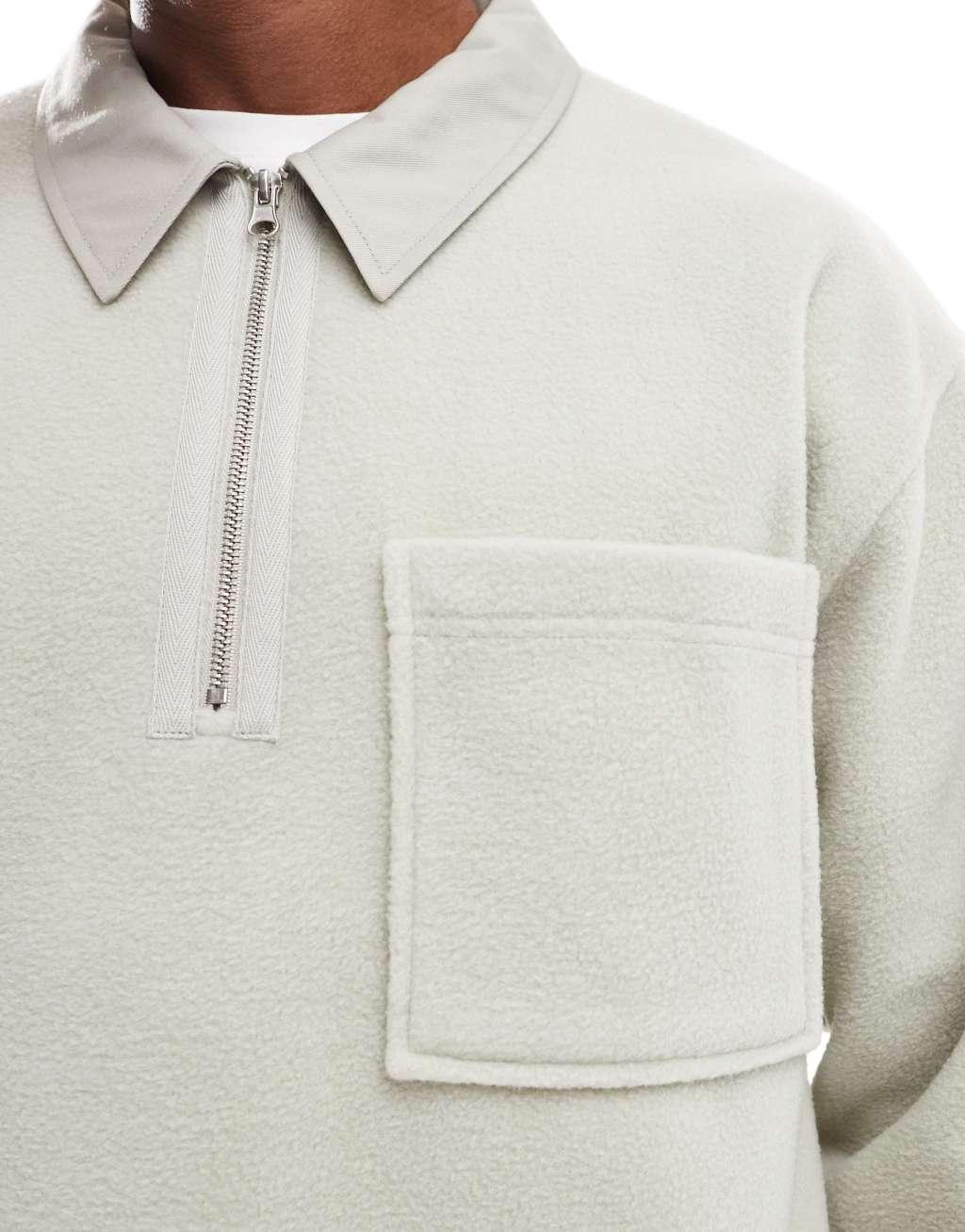 ASOS DESIGN oversized rugby polo fleece sweatshit with half zip in beige Product Image