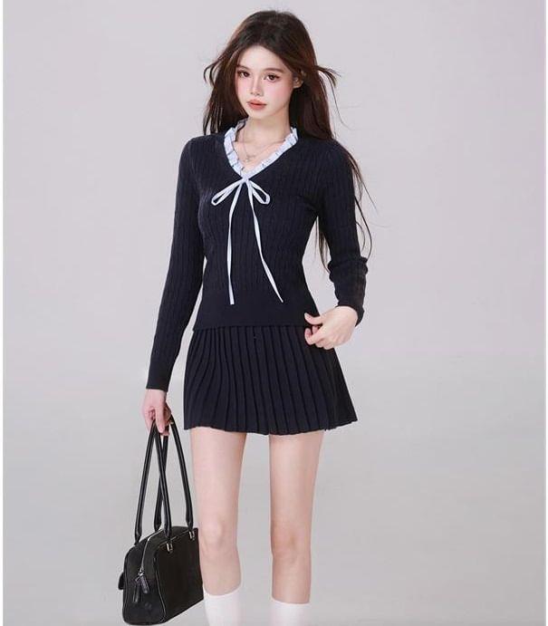 Set: Long-Sleeve V-Neck Bow Knit Top + Mid Rise Plain Mini Pleated Skirt Product Image