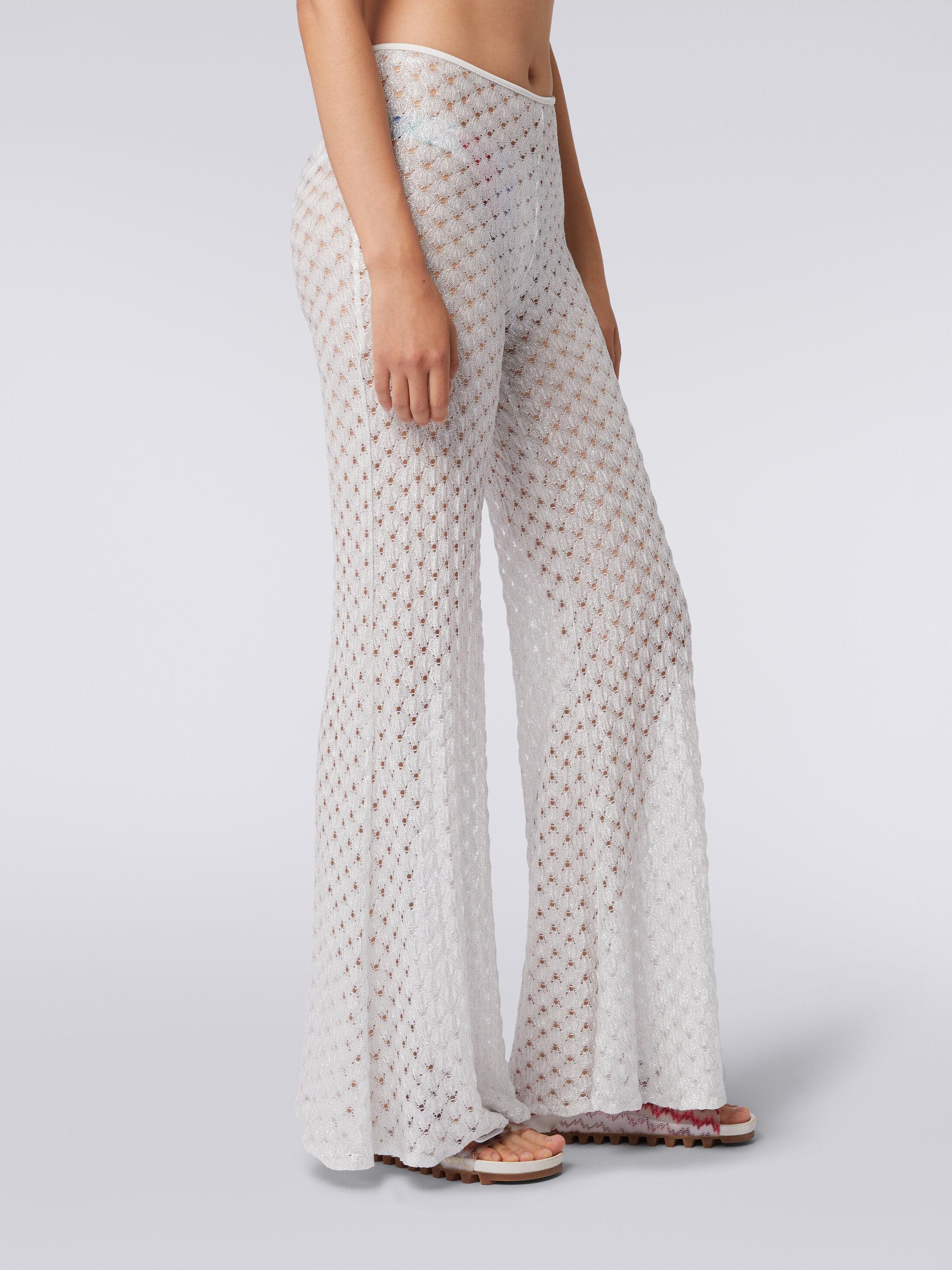 Lace-effect cover up trousers with flared hem Product Image