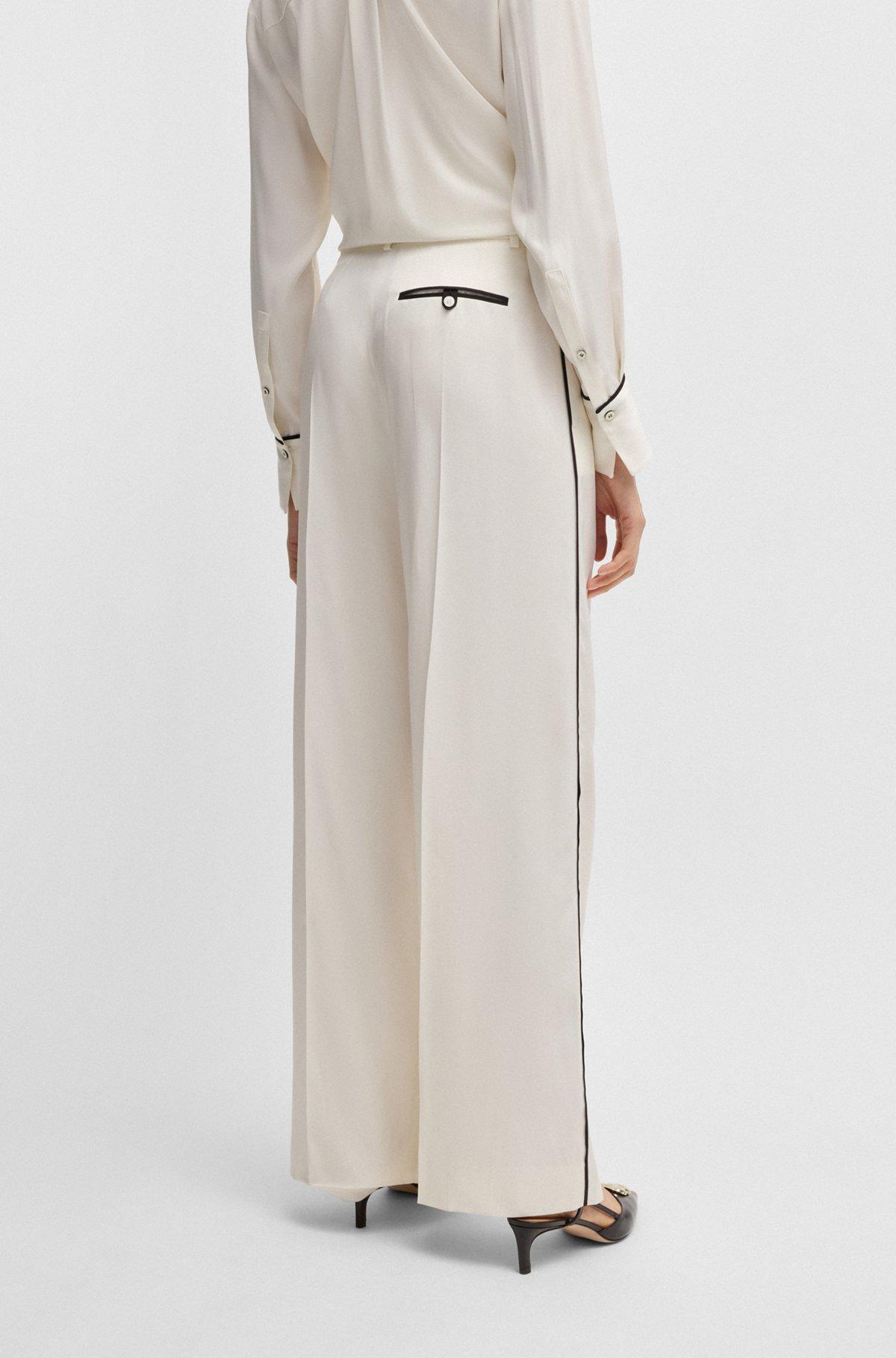 Relaxed-fit trousers with a wide leg Product Image