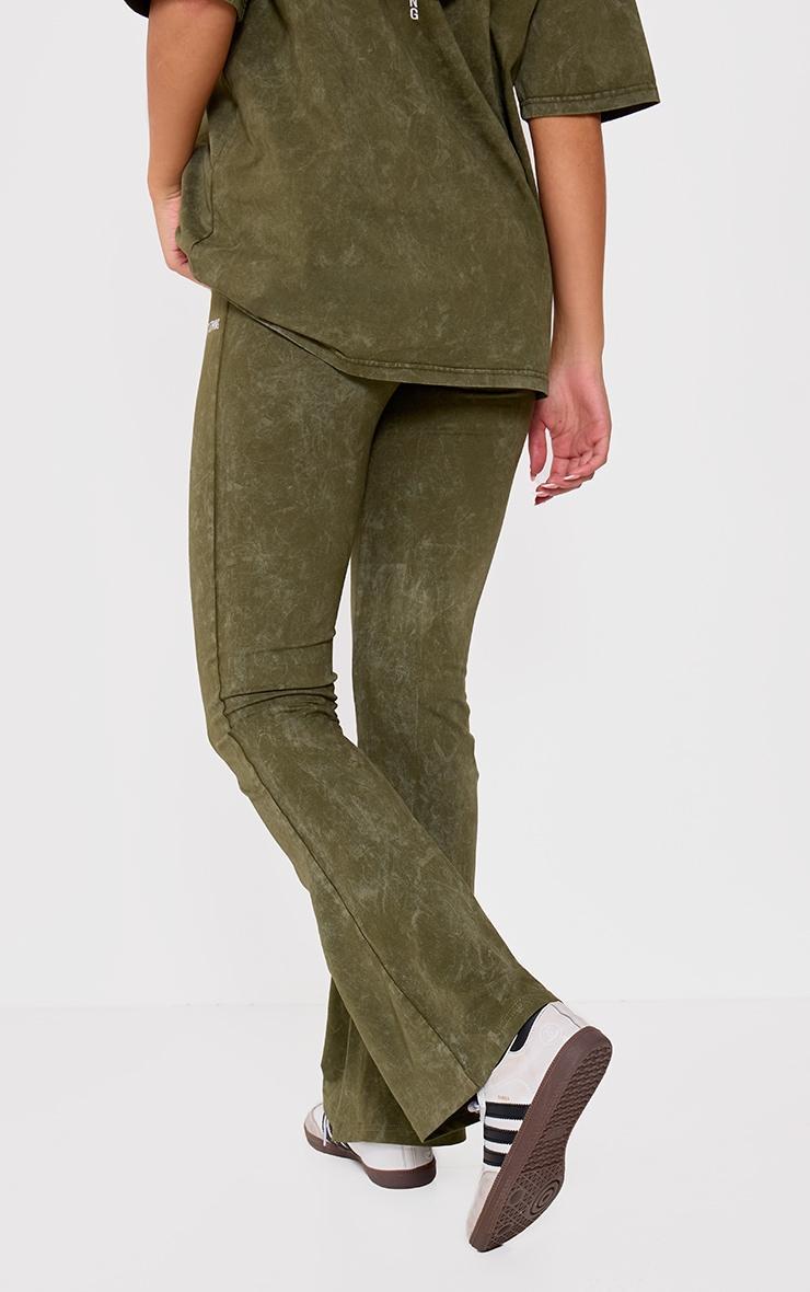 PRETTYLITTLETHING Khaki Print Washed High Waist Flared Pants Product Image