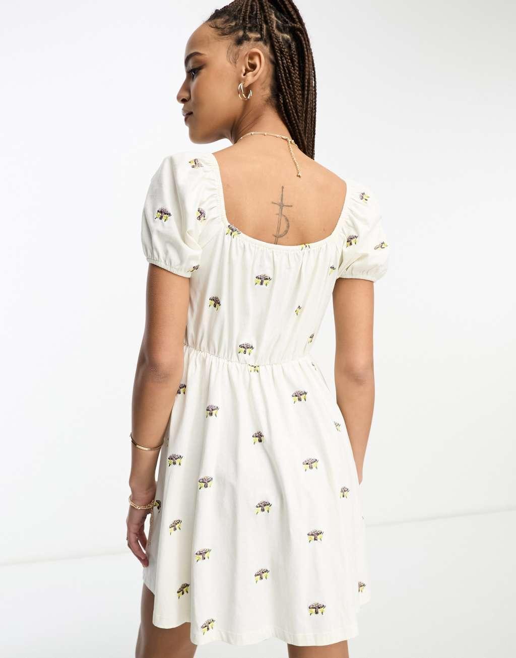 ASOS DESIGN embroidered v neck mini dress with mushroom embroidery in ecru Product Image