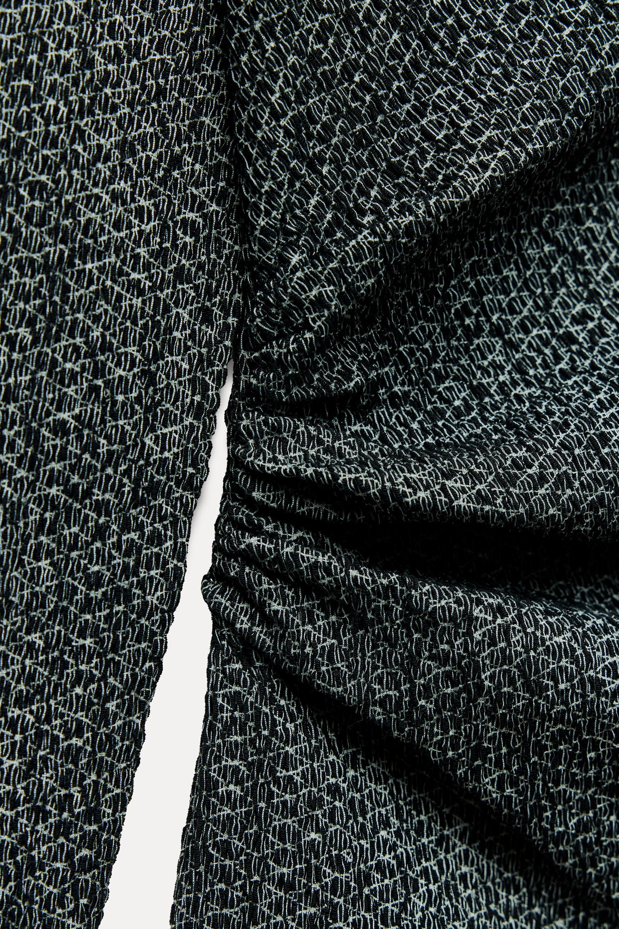 TEXTURED ASYMMETRIC TOP Product Image