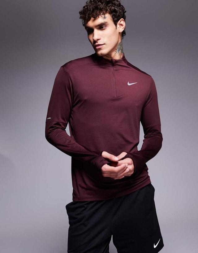 Nike Running Element half zip sweatshirt in burgundy Product Image