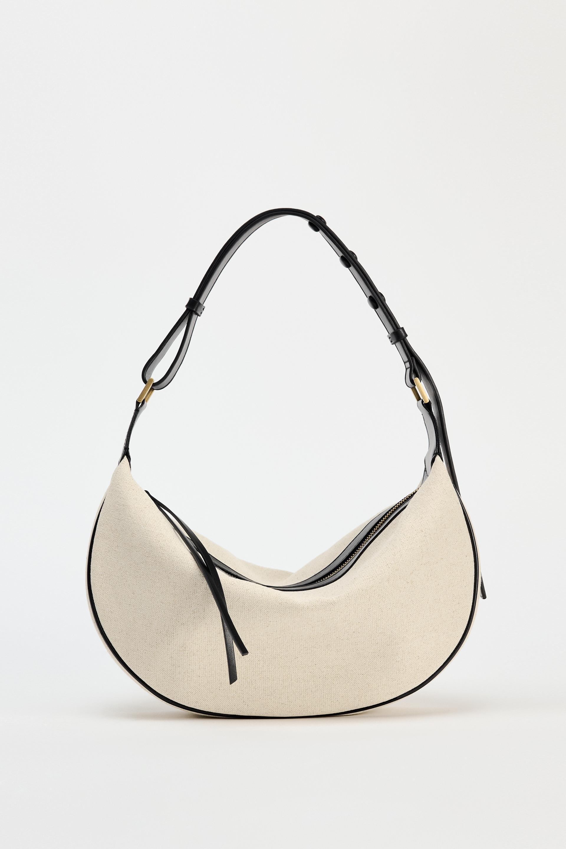 OVAL CROSSBODY BAG Product Image