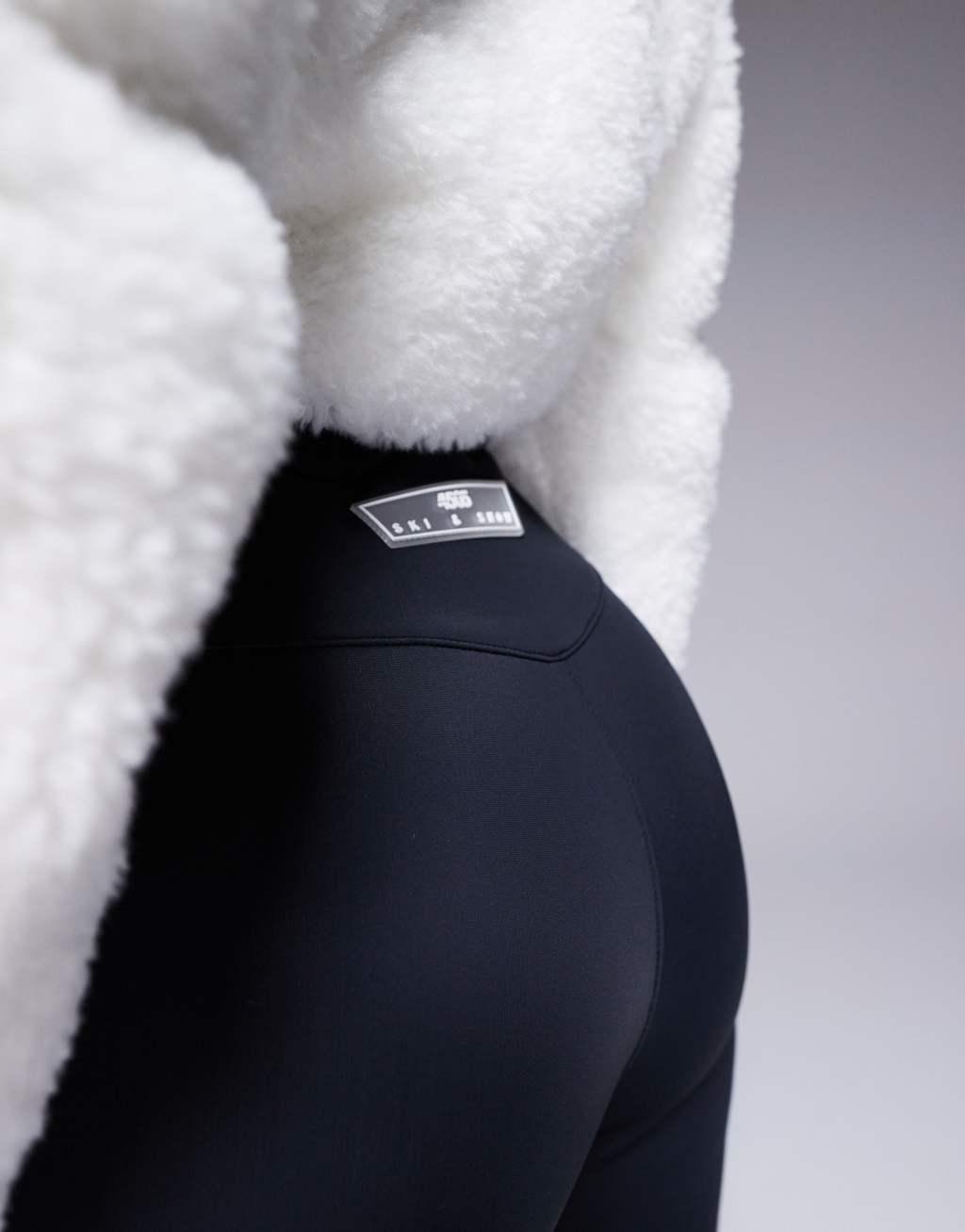 ASOS 4505 Ski suit with faux fur panels and skinny leg in black and white Product Image