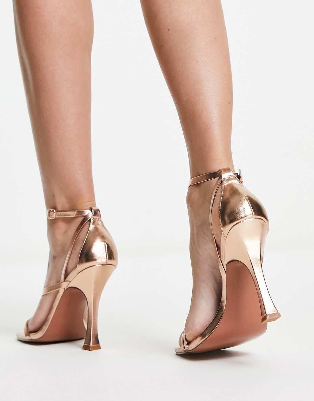 ASOS DESIGN Nelly asymmetric high heeled sandals In rose gold Product Image