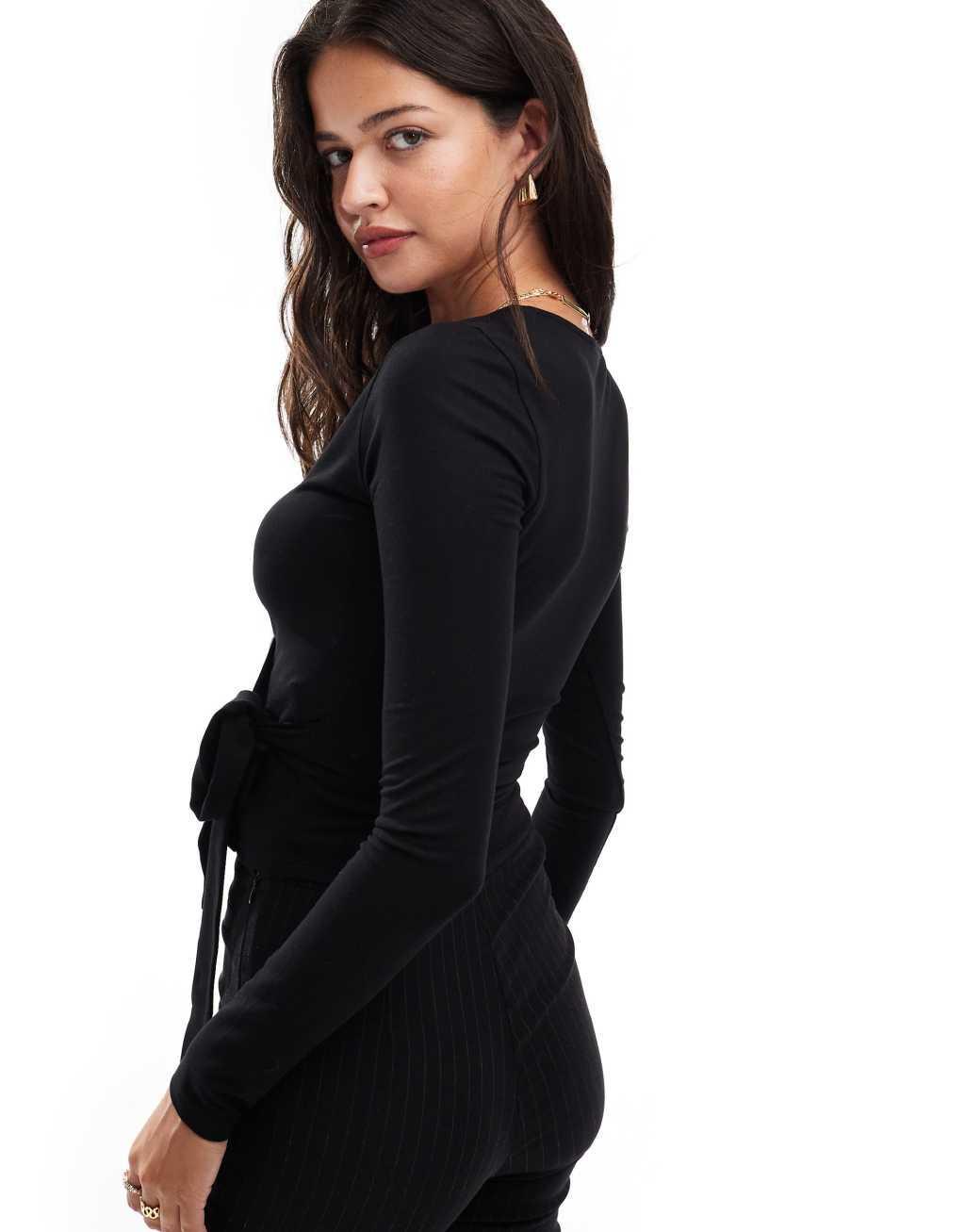 Miss Selfridge long sleeve jersey wrap top in black Product Image