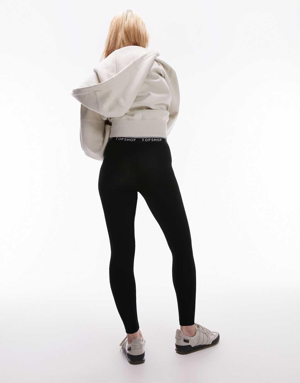 Topshop Petite branded elastic legging in black Product Image