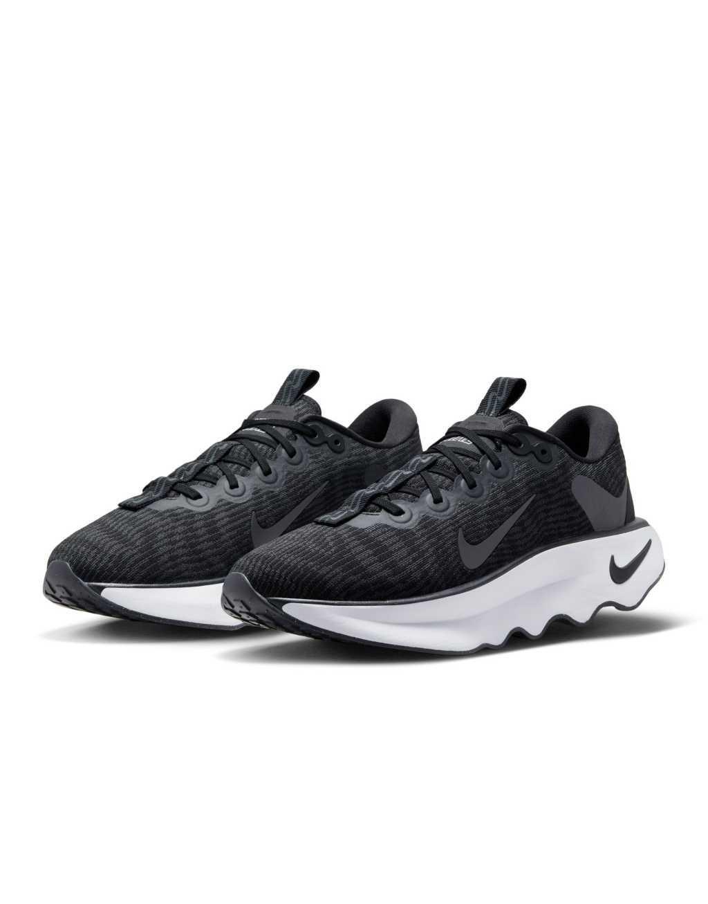 Nike Training Motiva sneakers in black and white Product Image