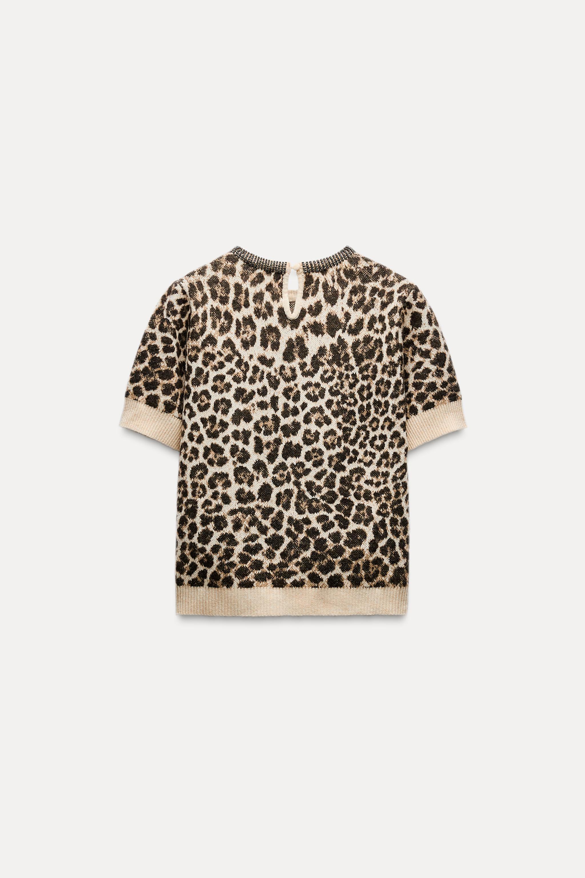 JACQUARD KNIT ANIMAL PRINT JEWELED NECKLINE TOP Product Image