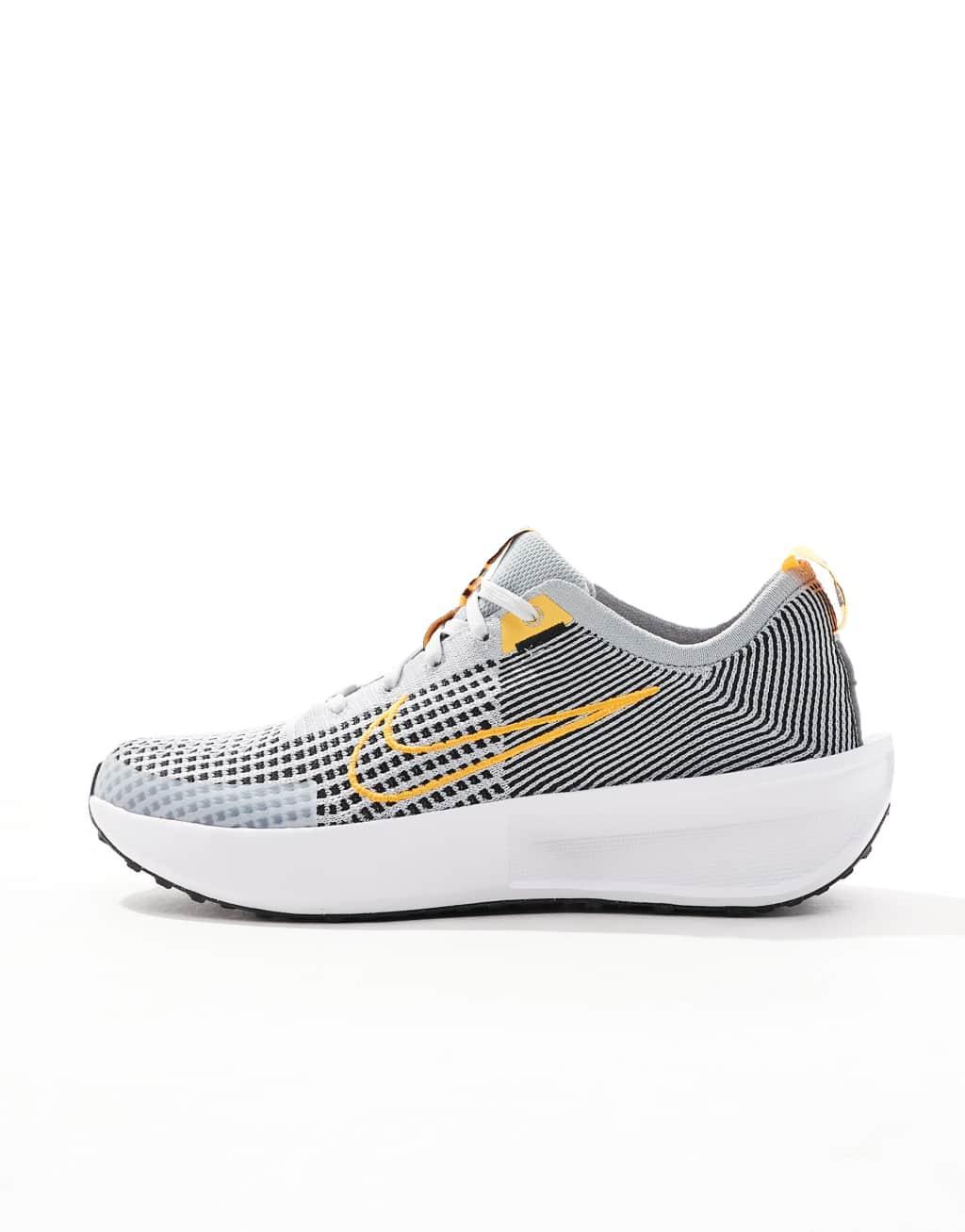 Nike Running Interact Run sneakers in gray and orange Product Image