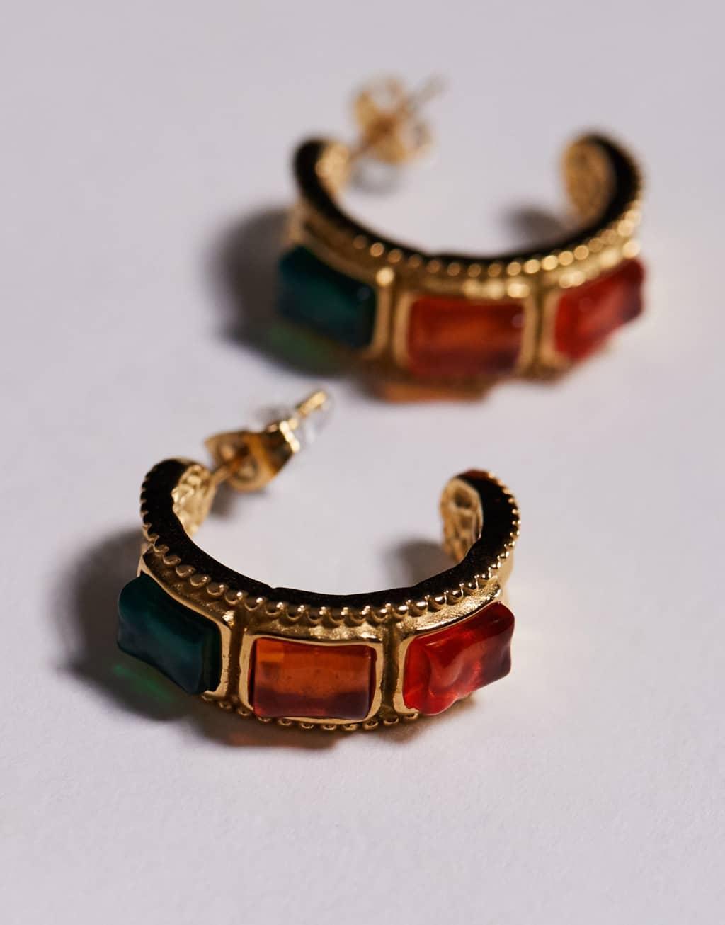 8 Other Reasons chunky hoop earrings with amber and green stone detail in 18k gold plated Product Image