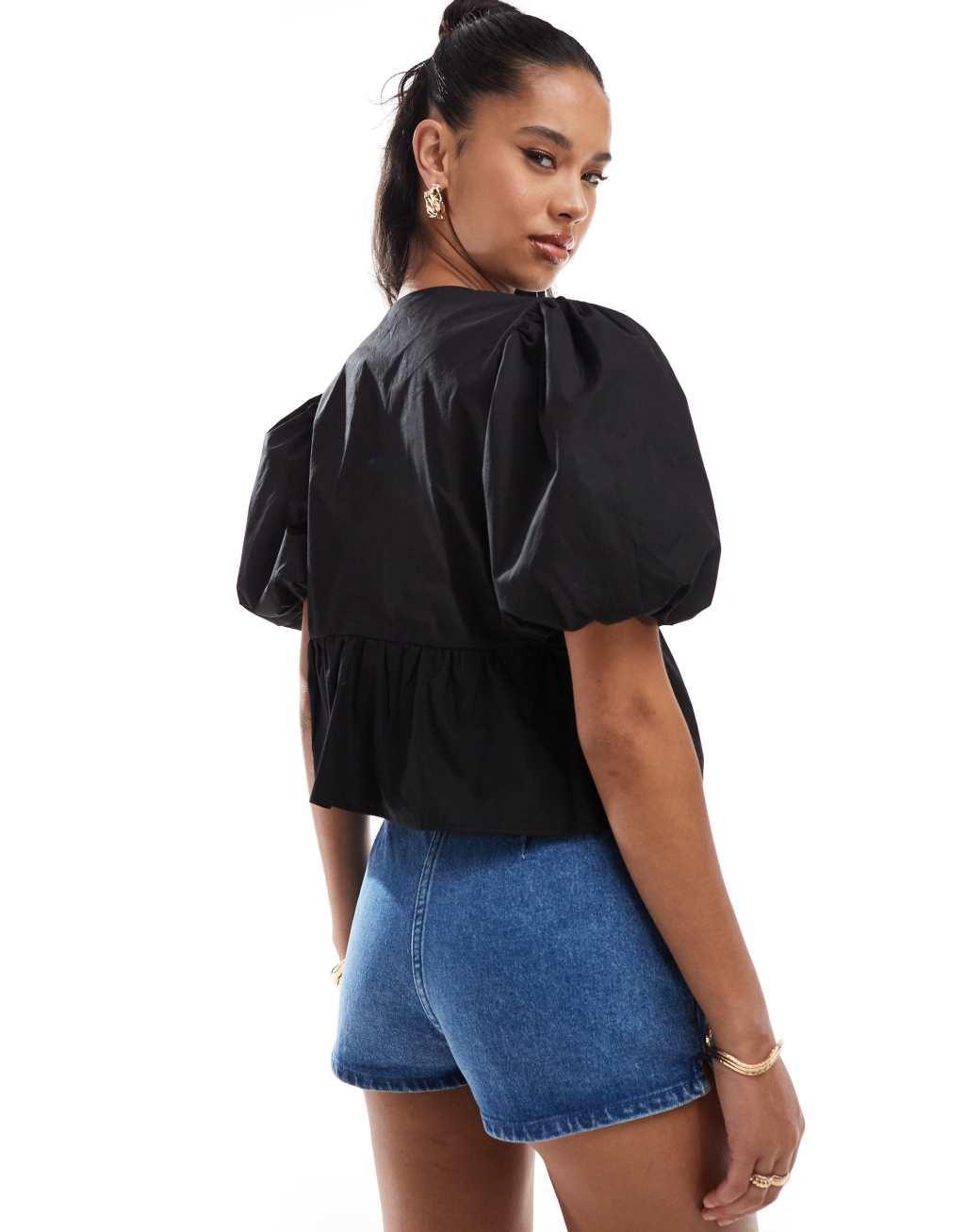 Kaiia puff sleeve tie front top in black Product Image