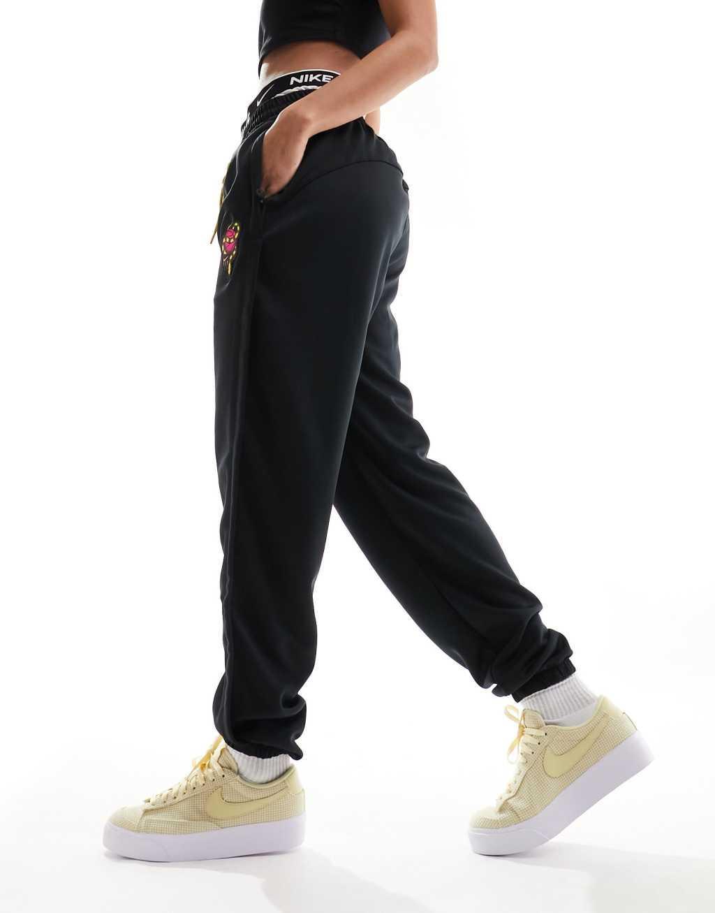 Nike Basketball Dri-FIT Retro Fly polyknit sweatpants in black Product Image