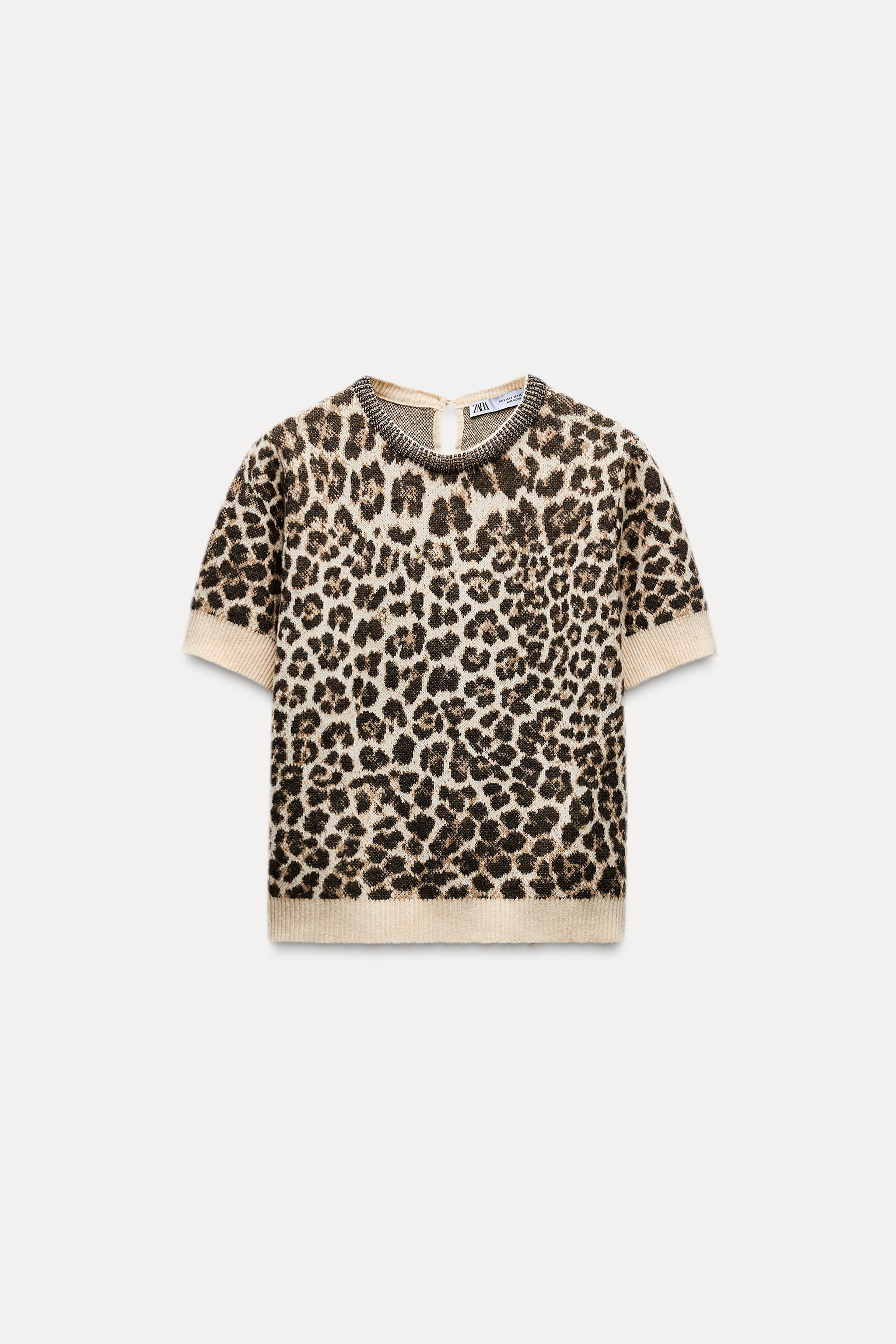 JACQUARD KNIT ANIMAL PRINT JEWELED NECKLINE TOP Product Image