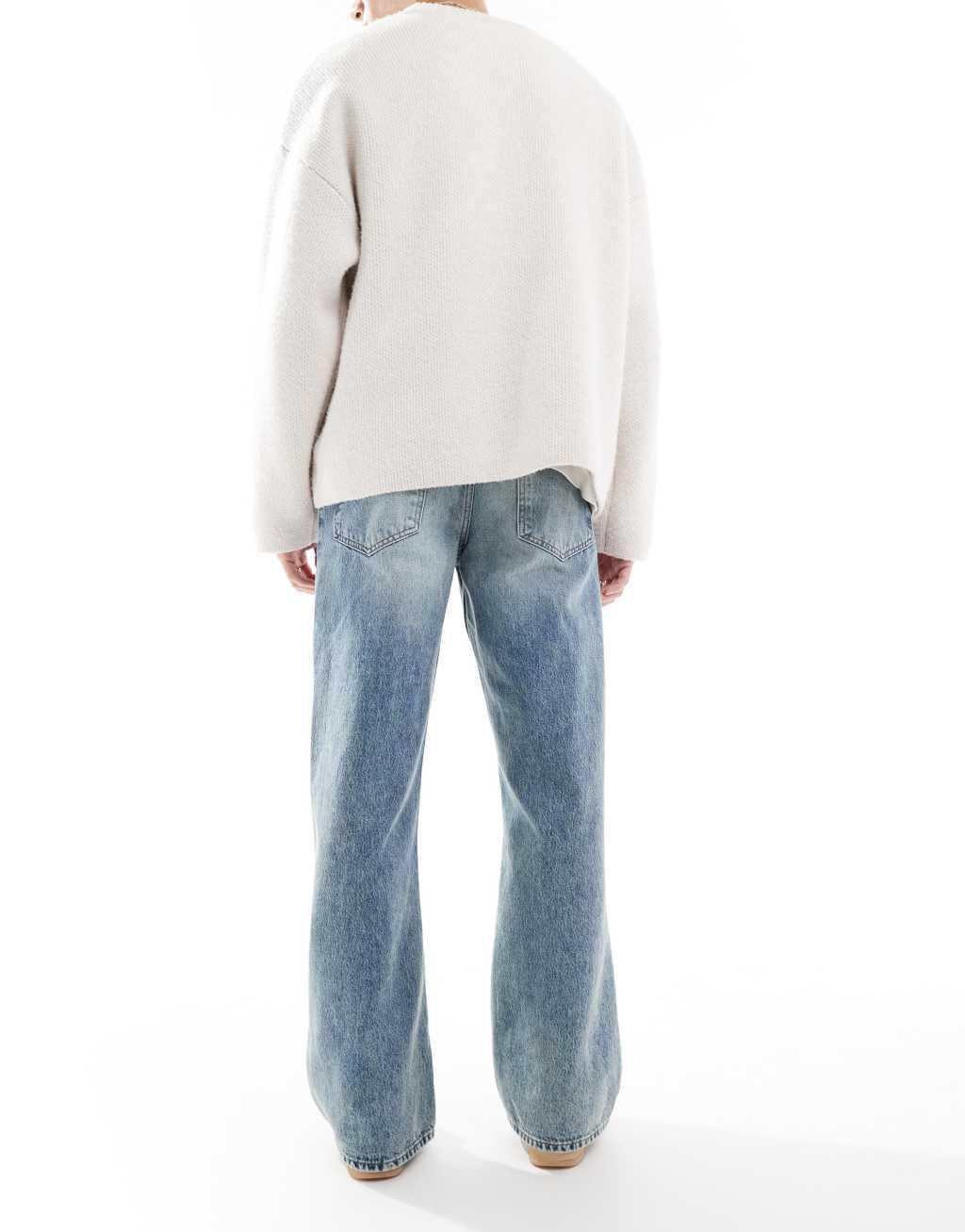 ASOS DESIGN wide flare jeans in light wash blue Product Image