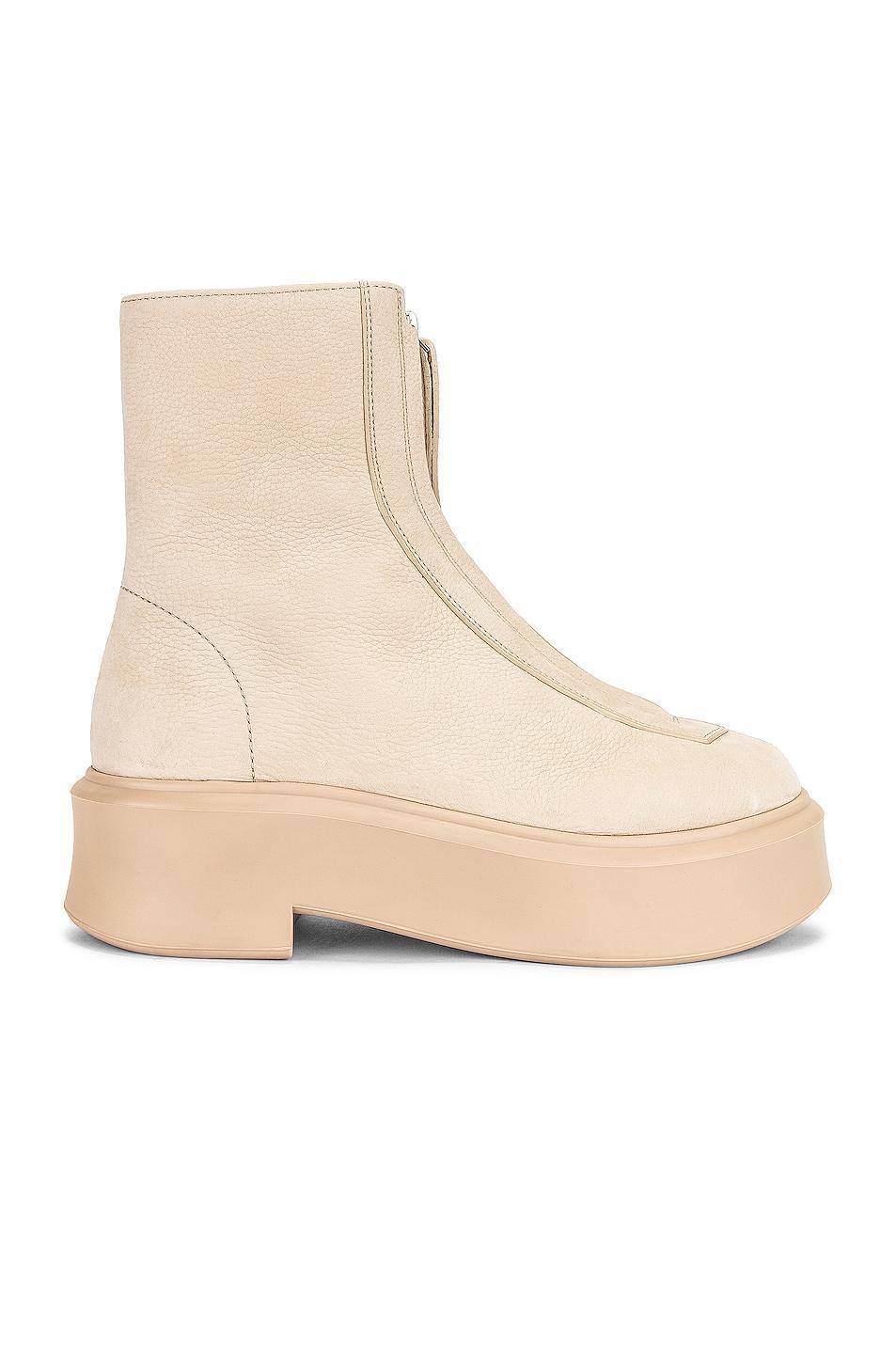 The Row Zipped Booties in Beige - Beige. Size 40.5 (also in 35.5, 40, 41). Product Image