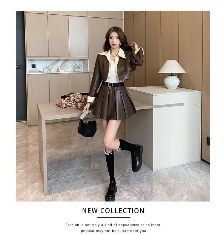 Set: Collared Mock Two Piece Faux Leather Crop Jacket + High Rise Plain Mini Pleated Skirt + Tank Top Product Image