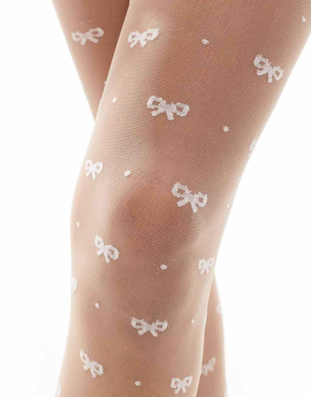 ASOS DESIGN bow and dot tights in white Product Image