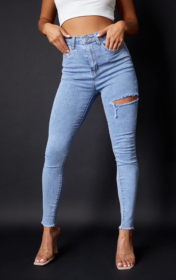 PRETTYLITTLETHING Petite Vintage Wash Thigh Rip Raw Hem 5 Pocket Skinny Jeans Product Image