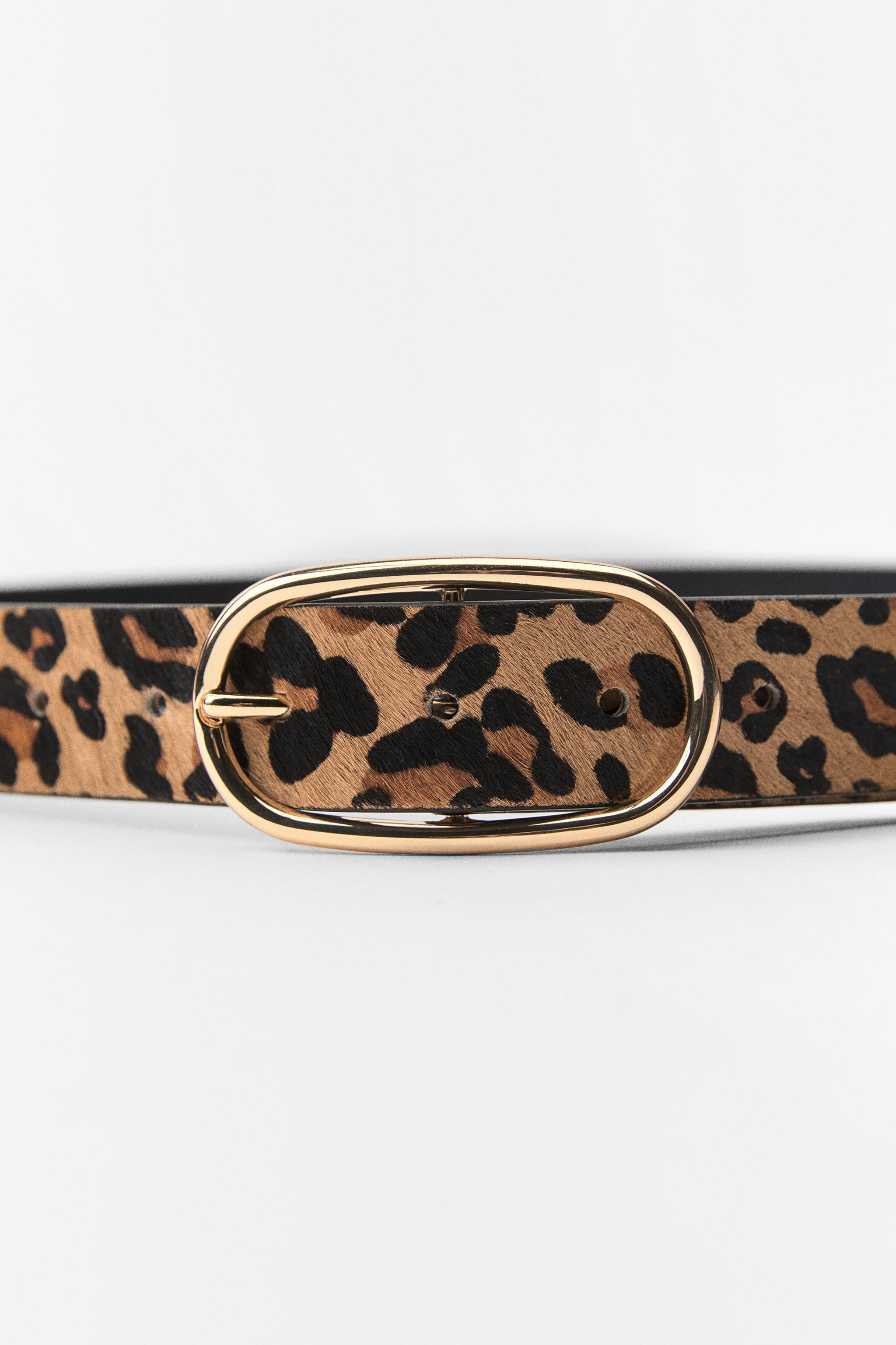 Belt made of printed leather with a width of 1.2 inches (3 cm). Oval metal buckle. Product Image