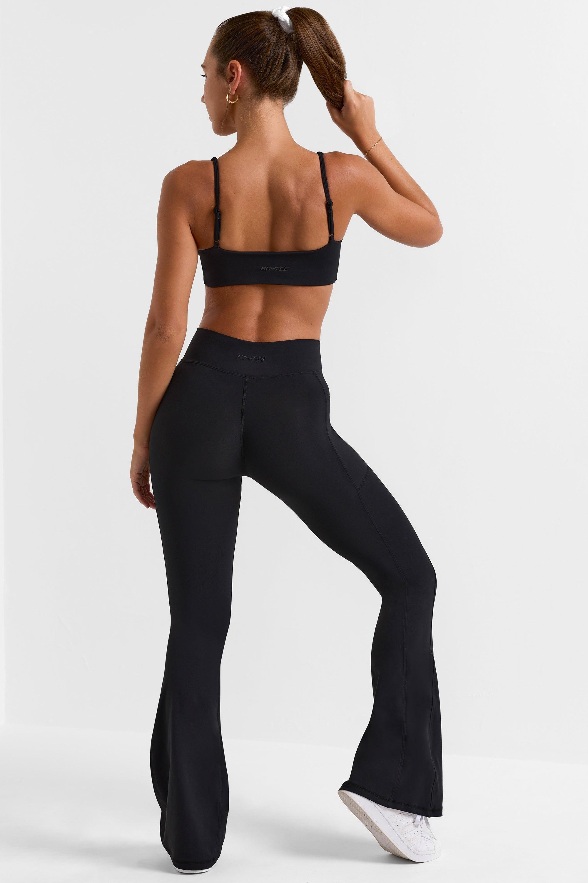 Soft Active Wrap Over Flared Leggings in Black Product Image