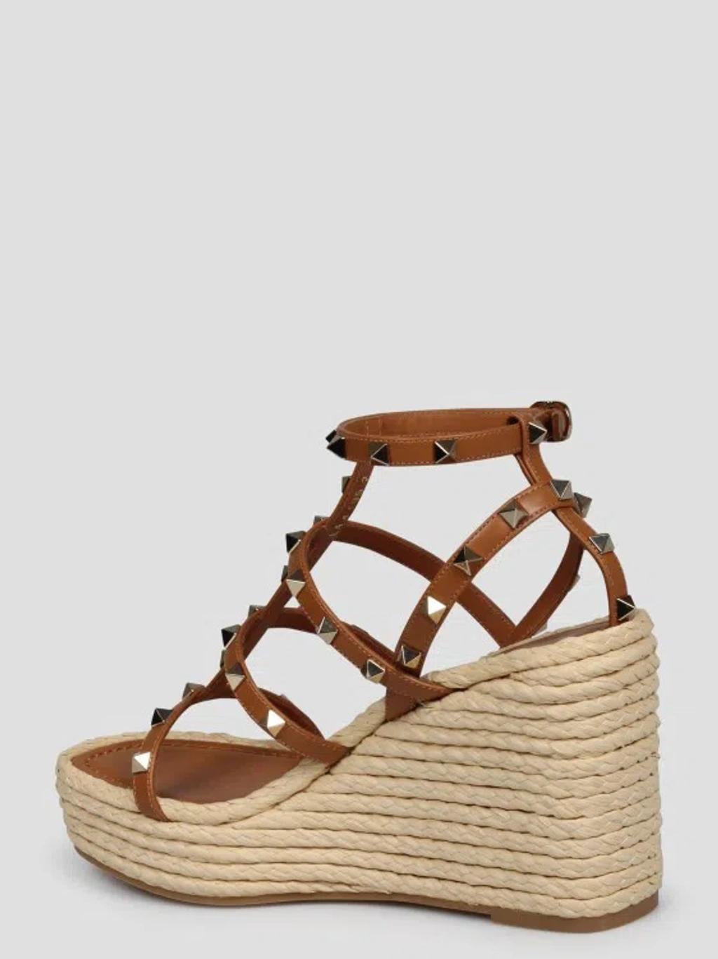 Valentino Rockstud Caged 95 Leather Wedge Sandal In Brown Product Image