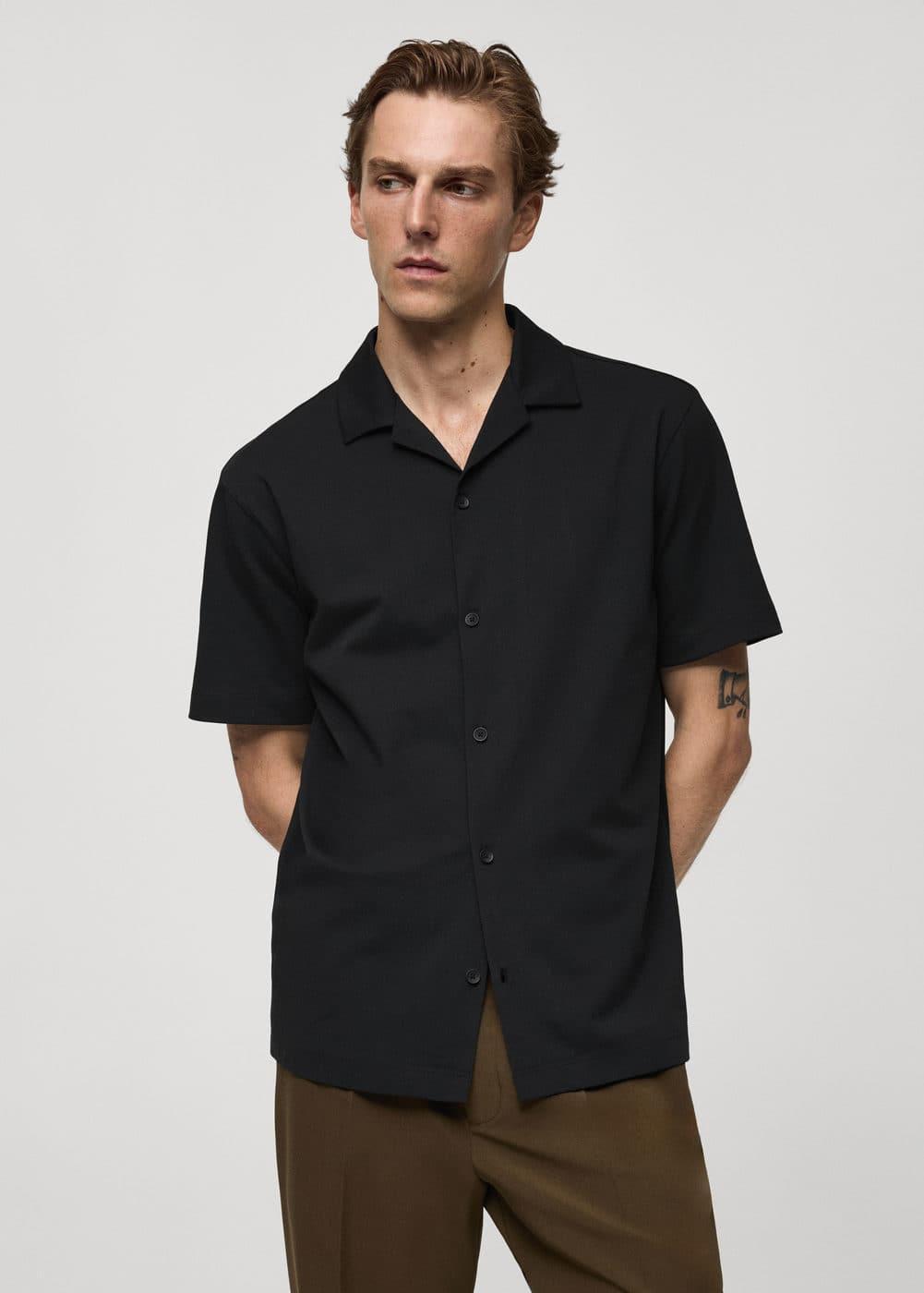 Short sleeved cotton shirt - Men | MANGO USA Product Image