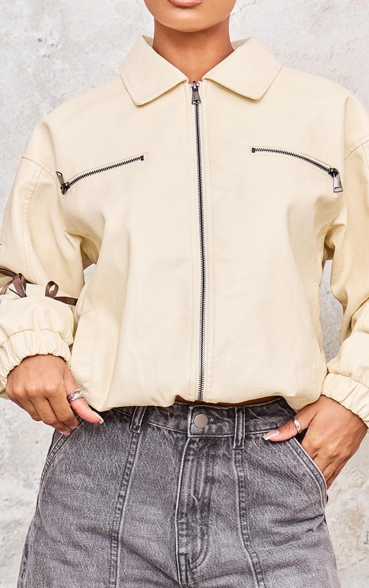 Cream Faux Leather Bow Sleeve Detail Oversized Jacket Product Image