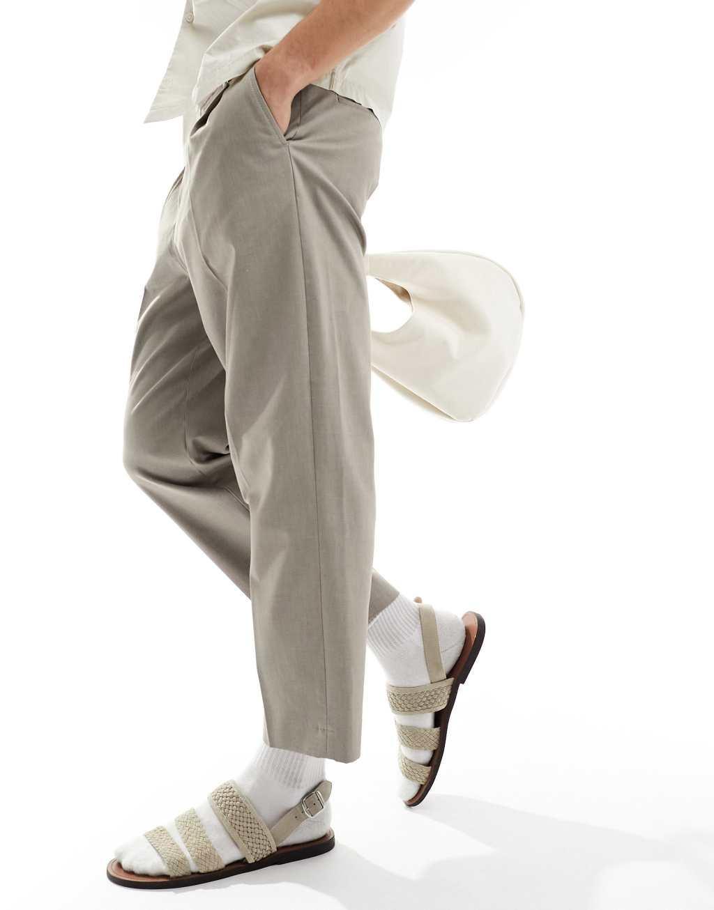 Selected Homme loose fit cropped pleat pants in beige Product Image