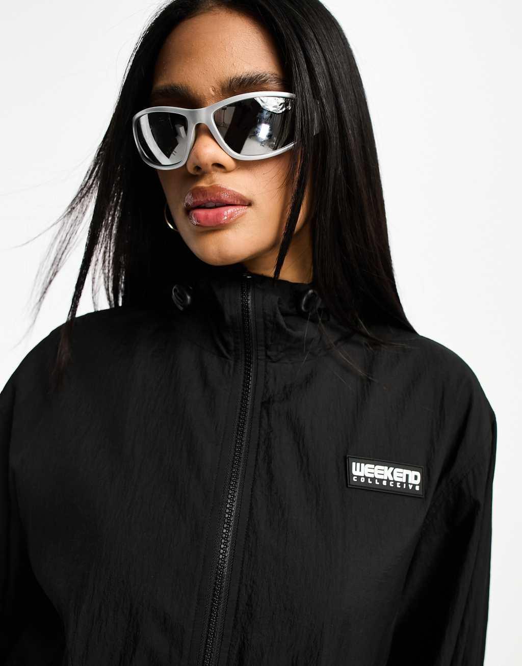 ASOS Weekend Collective rain coat in black Product Image