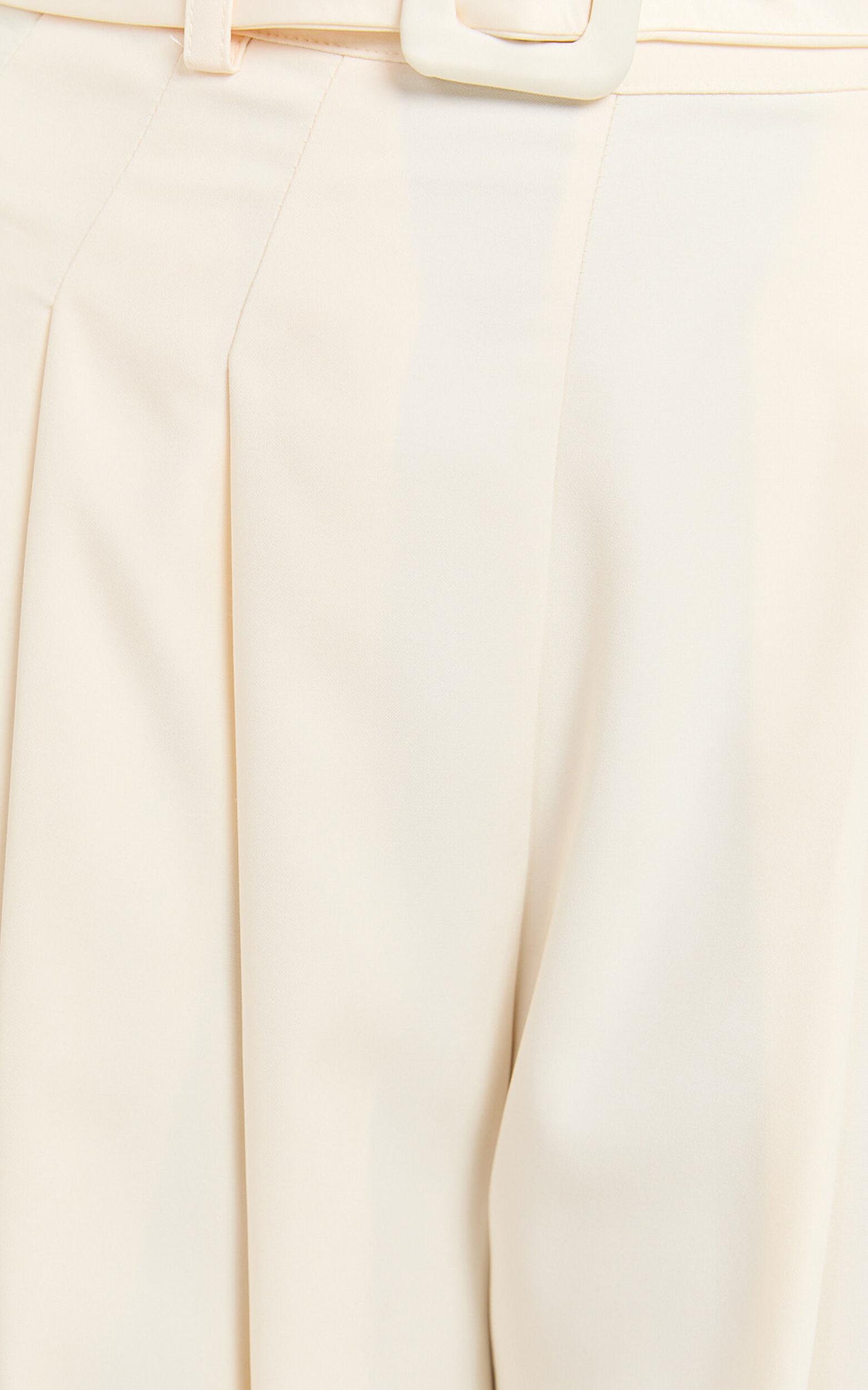 Amalie The Label - Raquelle Pleated Wid Leg Belted Pant in Ivory Product Image