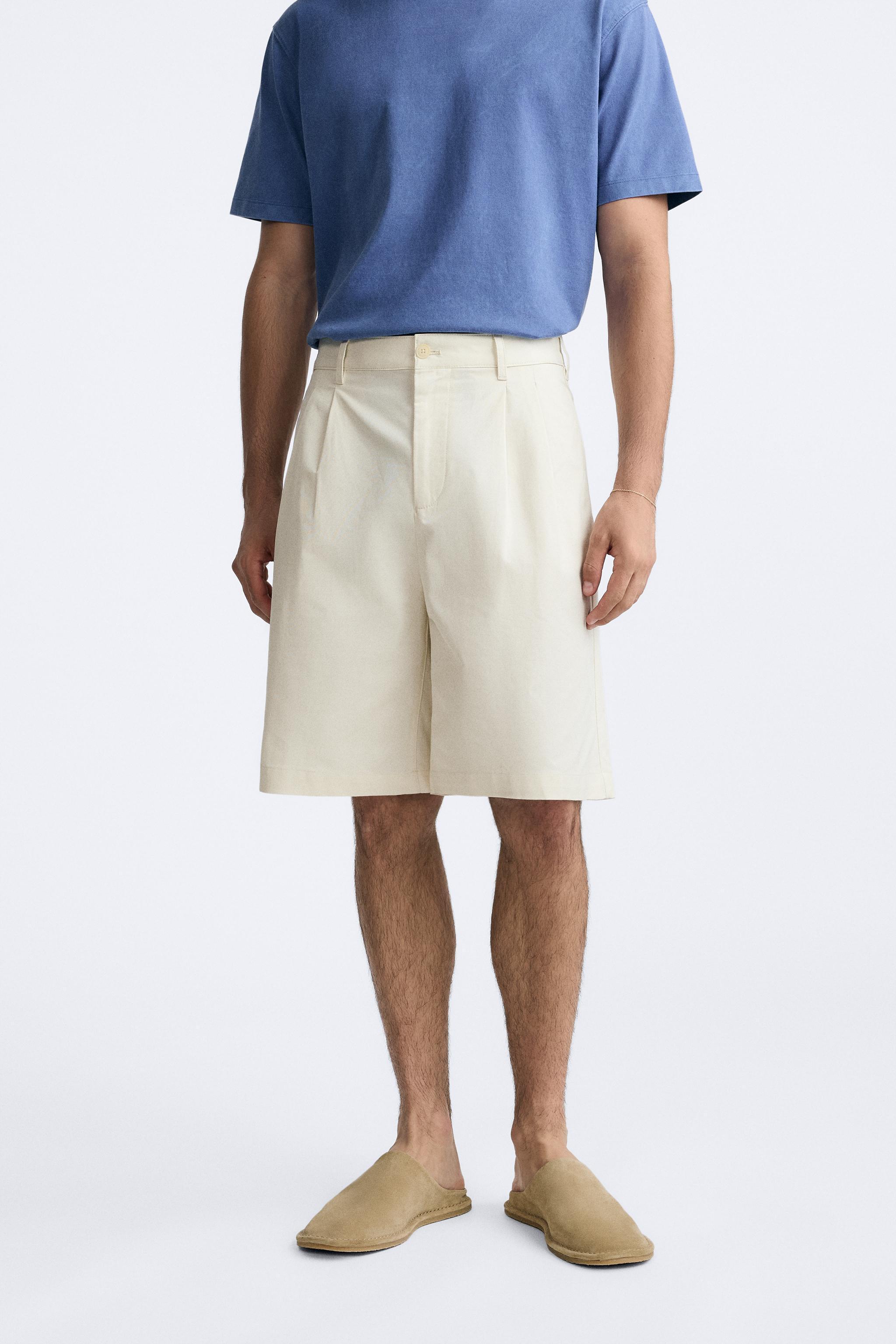 PLEATED WIDE FIT SHORTS Product Image