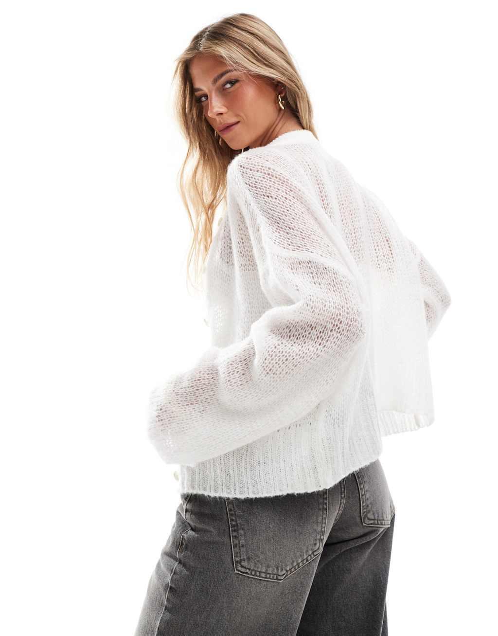 ASOS DESIGN crew neck cardigan in loose knit in cream Product Image