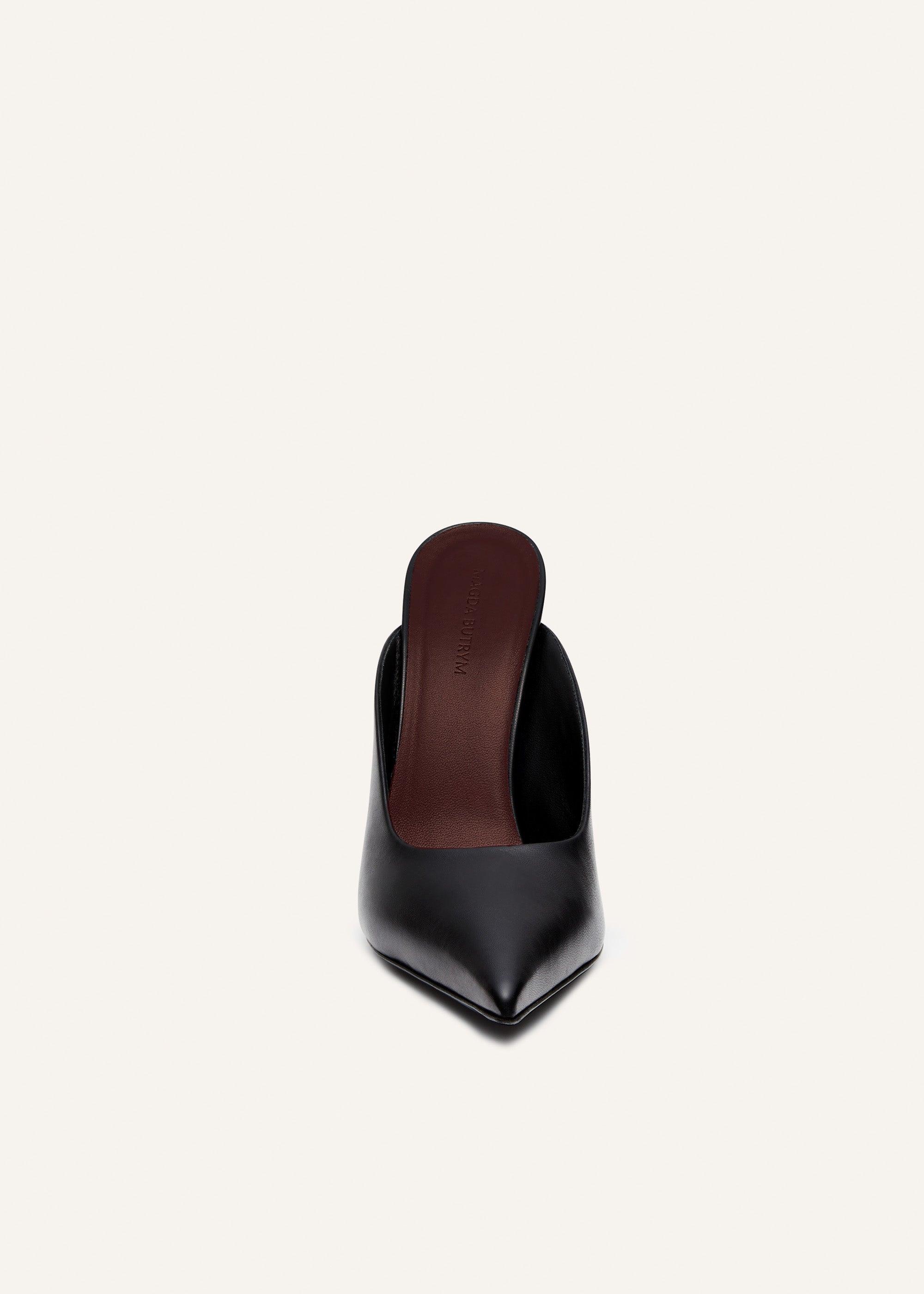 Pointed-toe mules in black leather Product Image