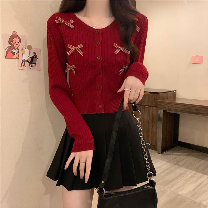 Long-Sleeve Crew Neck Bow Ribbed Button Knit Top Product Image