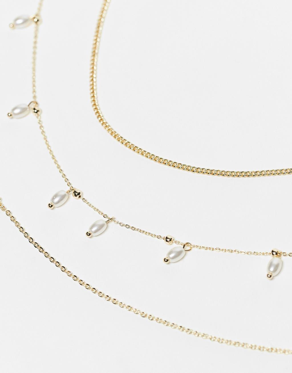 Pieces Curve 3 pack tiered necklaces with faux pearl detail in gold Product Image