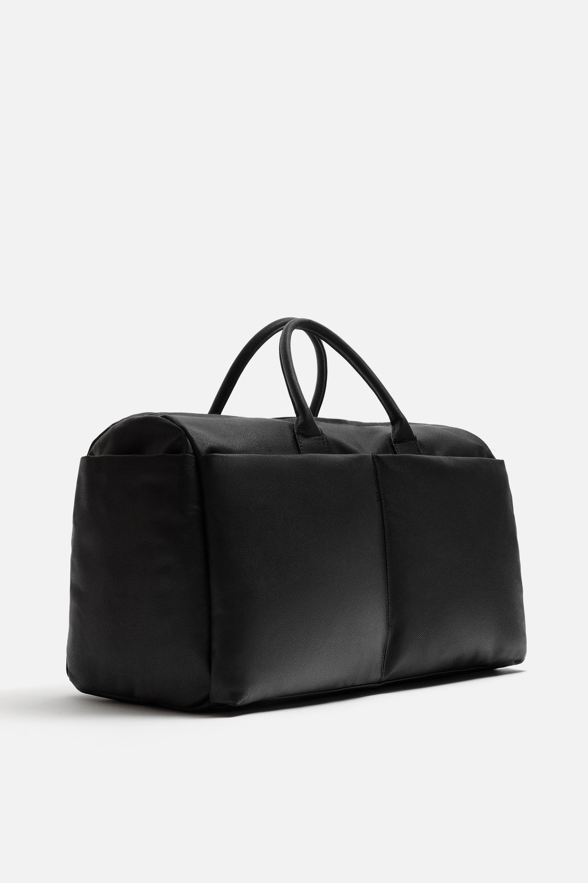 TRAVEL BAG WITH POCKETS Product Image