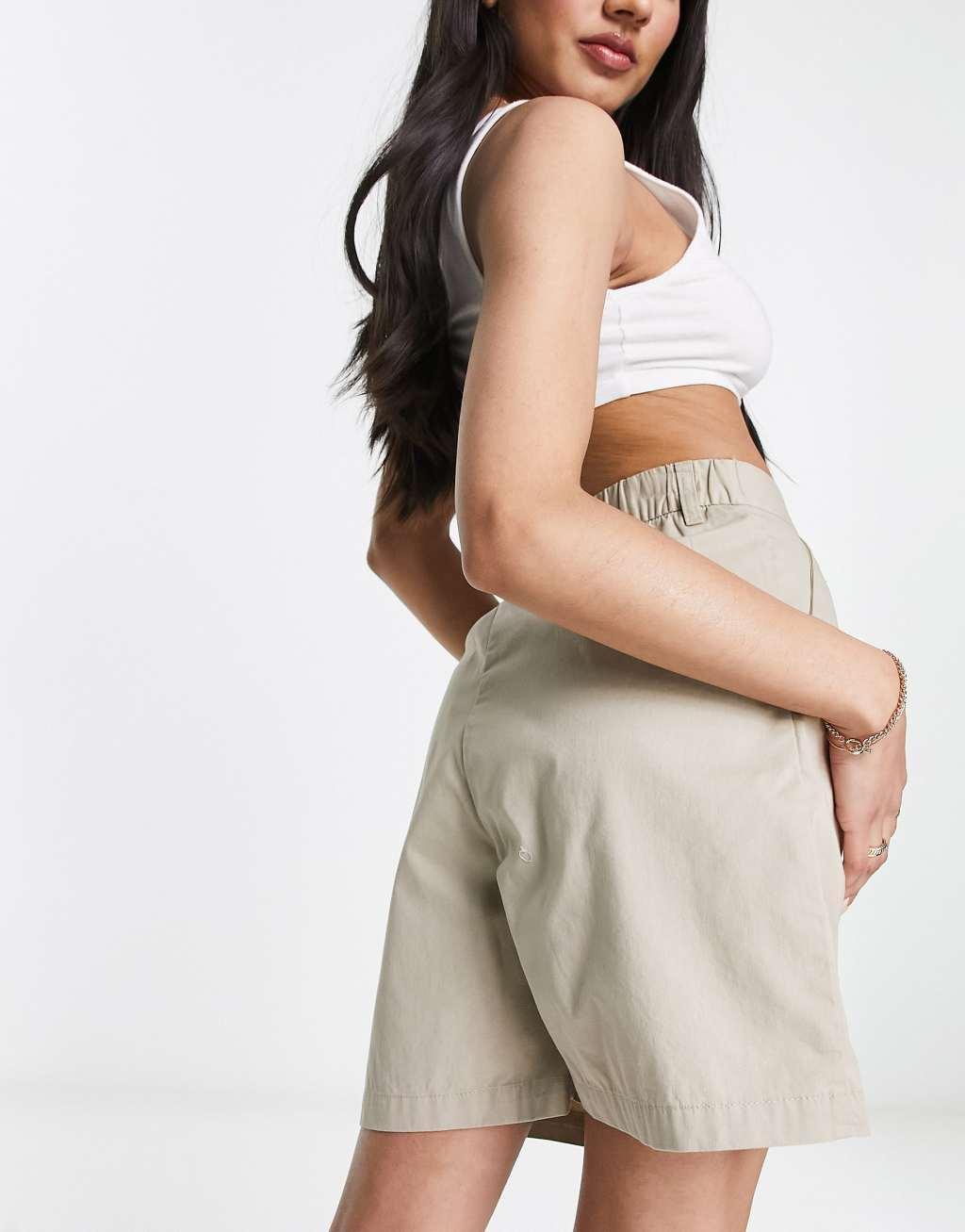 Monki tailored turn-up shorts in beige Product Image