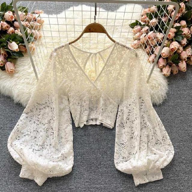 Olivia Mark –  Autumn Fashion Blouse featuring Exquisite Floral Lace, Backless Design, and Stylish Tie Straps Product Image