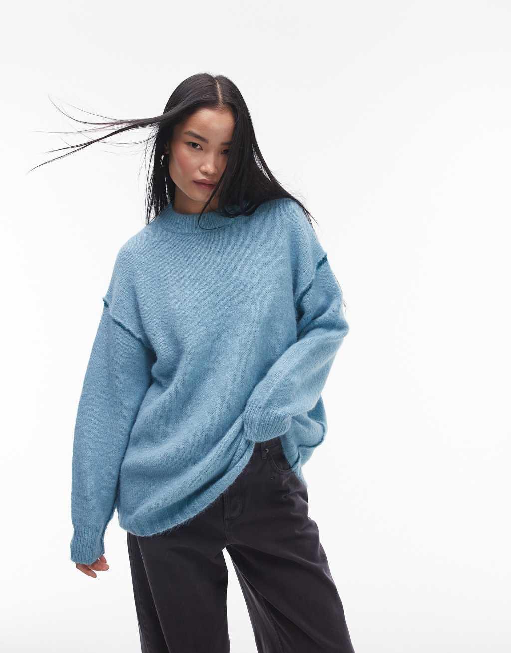 Topshop knitted exposed contrast seam oversized sweater in blue Product Image