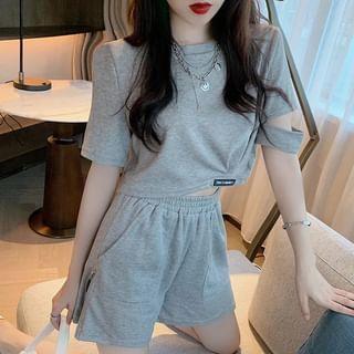 Set: Short-Sleeve Crew Neck Plain Cutout Crop T-Shirt + High Waist Zip Detail Shorts Product Image