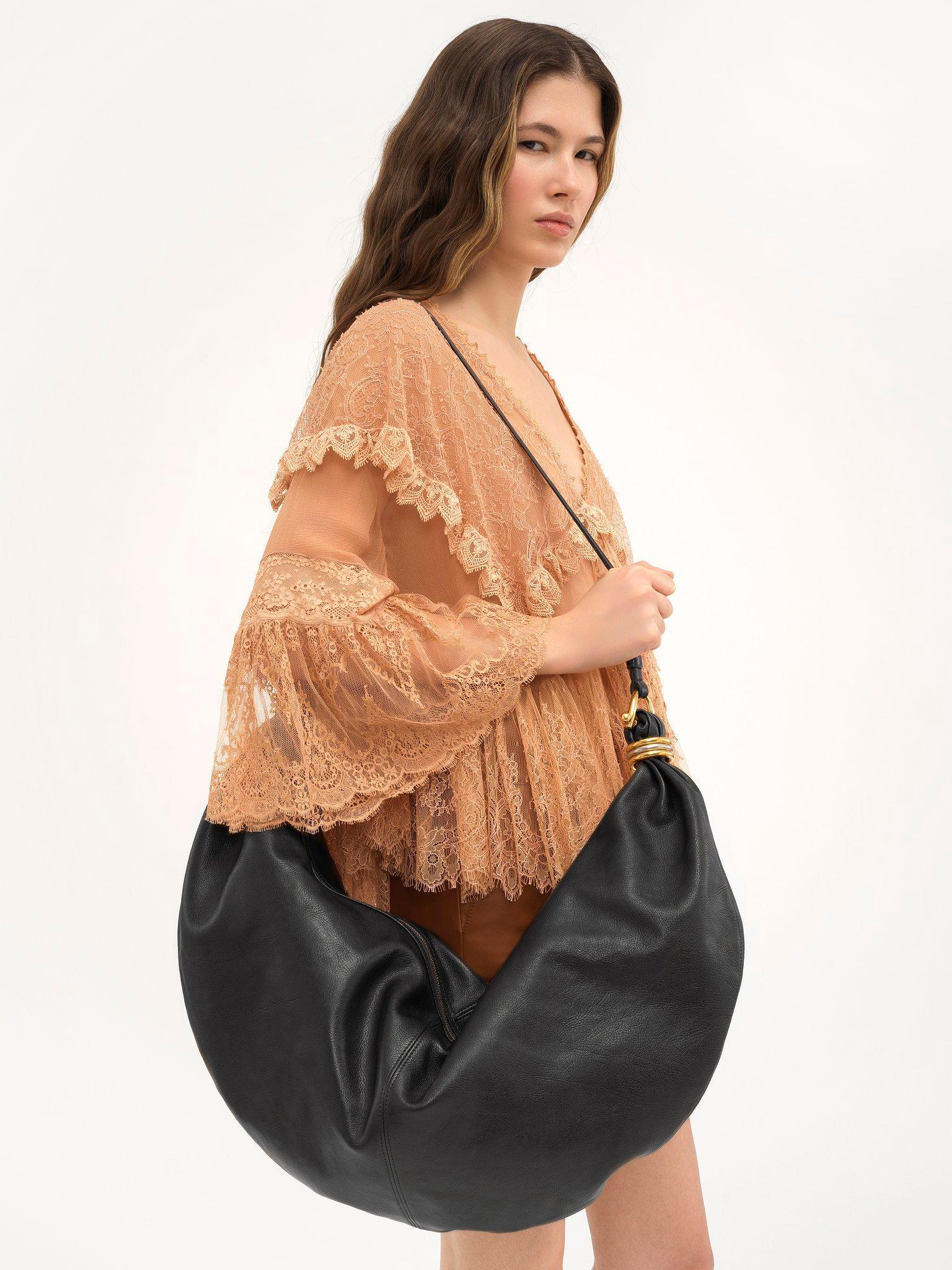 Large Bracelet Hobo bag in grained leather Product Image