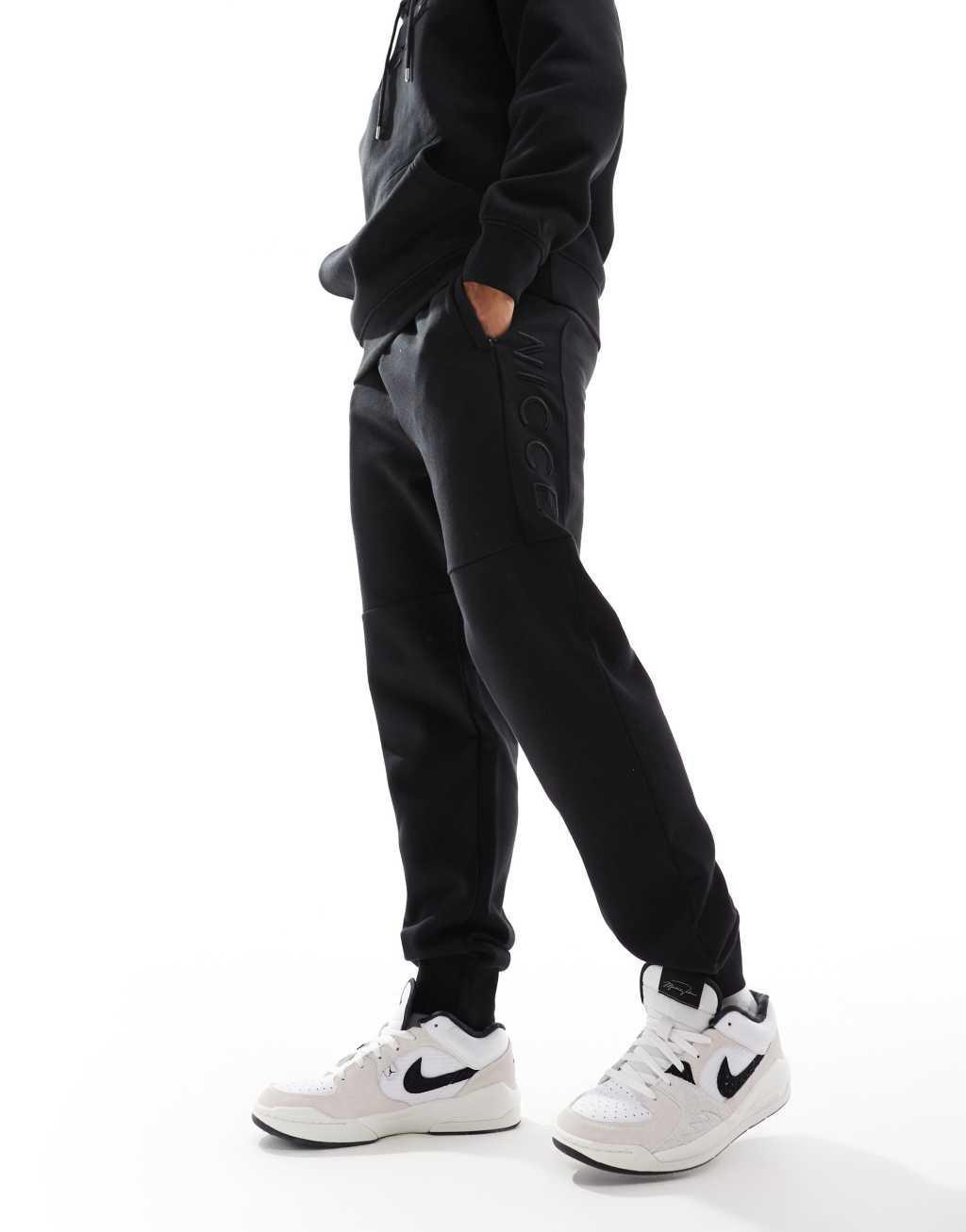 Nicce logo sweatpants in black Product Image