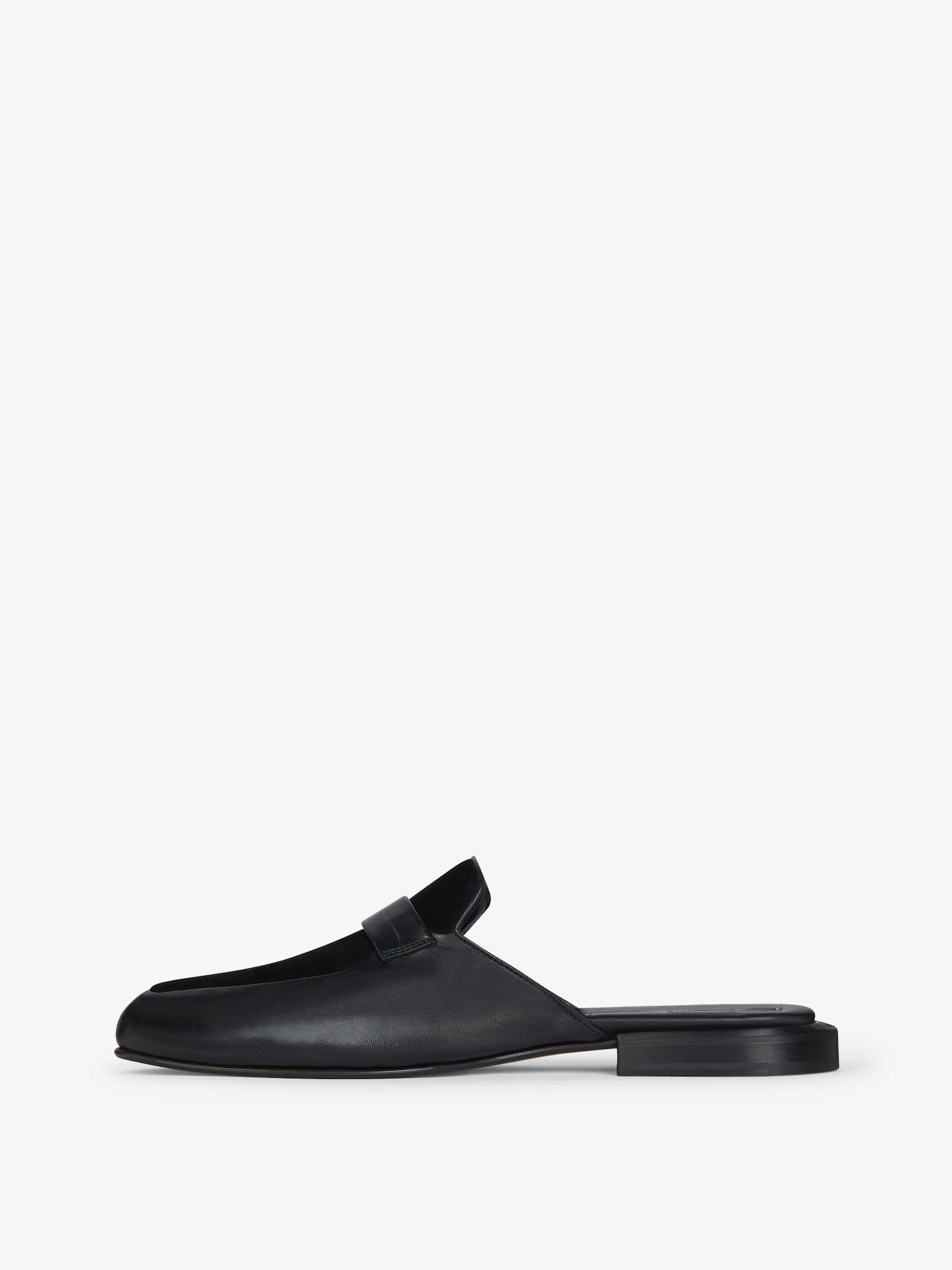 Flat mules in leather and suede Product Image